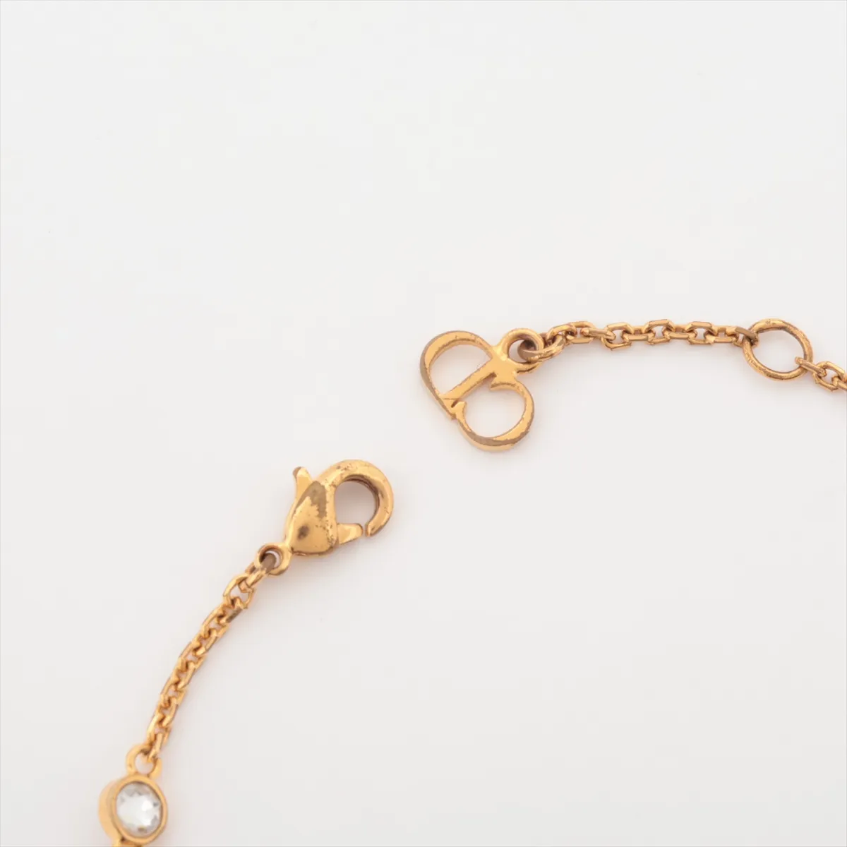 Clair D Lune bracelet, gold-plated with rhinestones and faux pearls. Shows signs of wear including dents, chips, — view 4