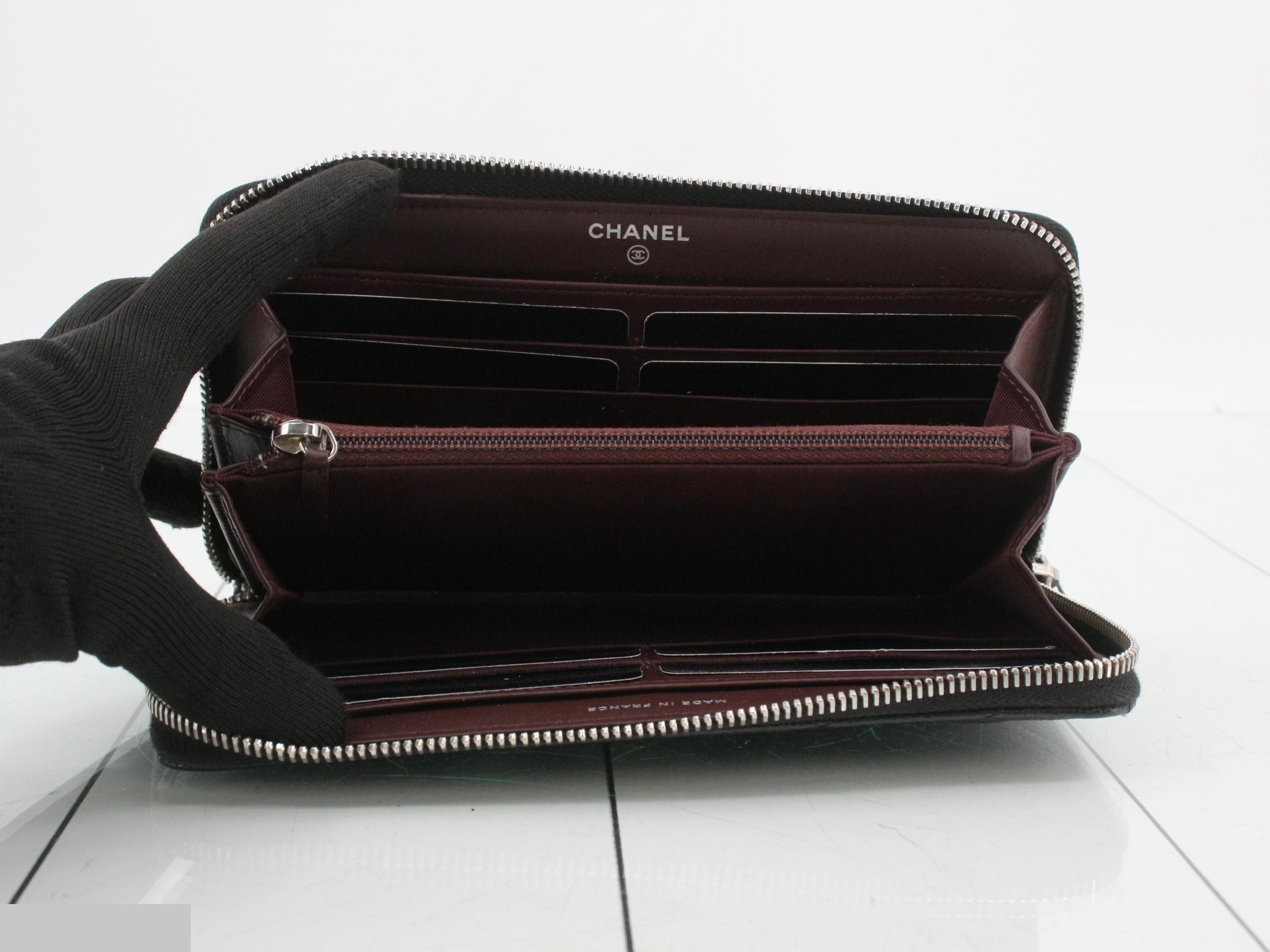 Caviar leather long wallet, serial number in the 25 range, includes guarantee card, dust bag, box, and instruction manual. — view 4
