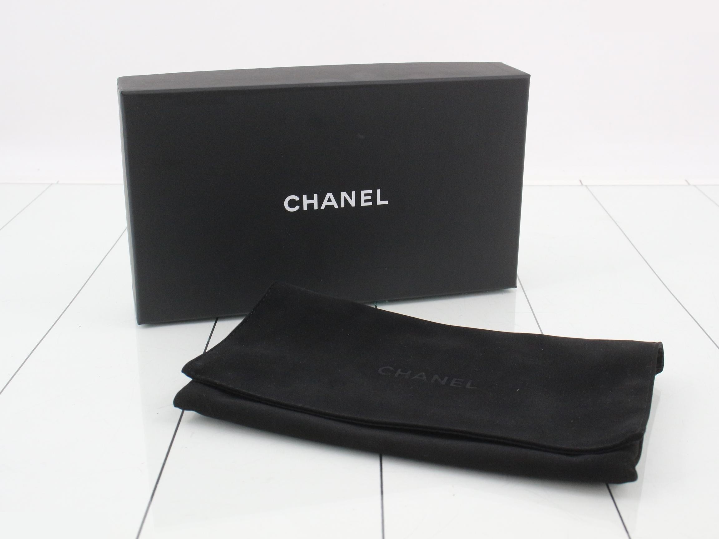 Caviar leather long wallet, serial number in the 25 range, includes guarantee card, dust bag, box, and instruction manual. — view 5