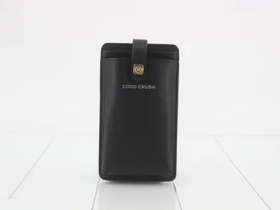 Unused Chanel pouch/phone case with chain shoulder strap, with box.