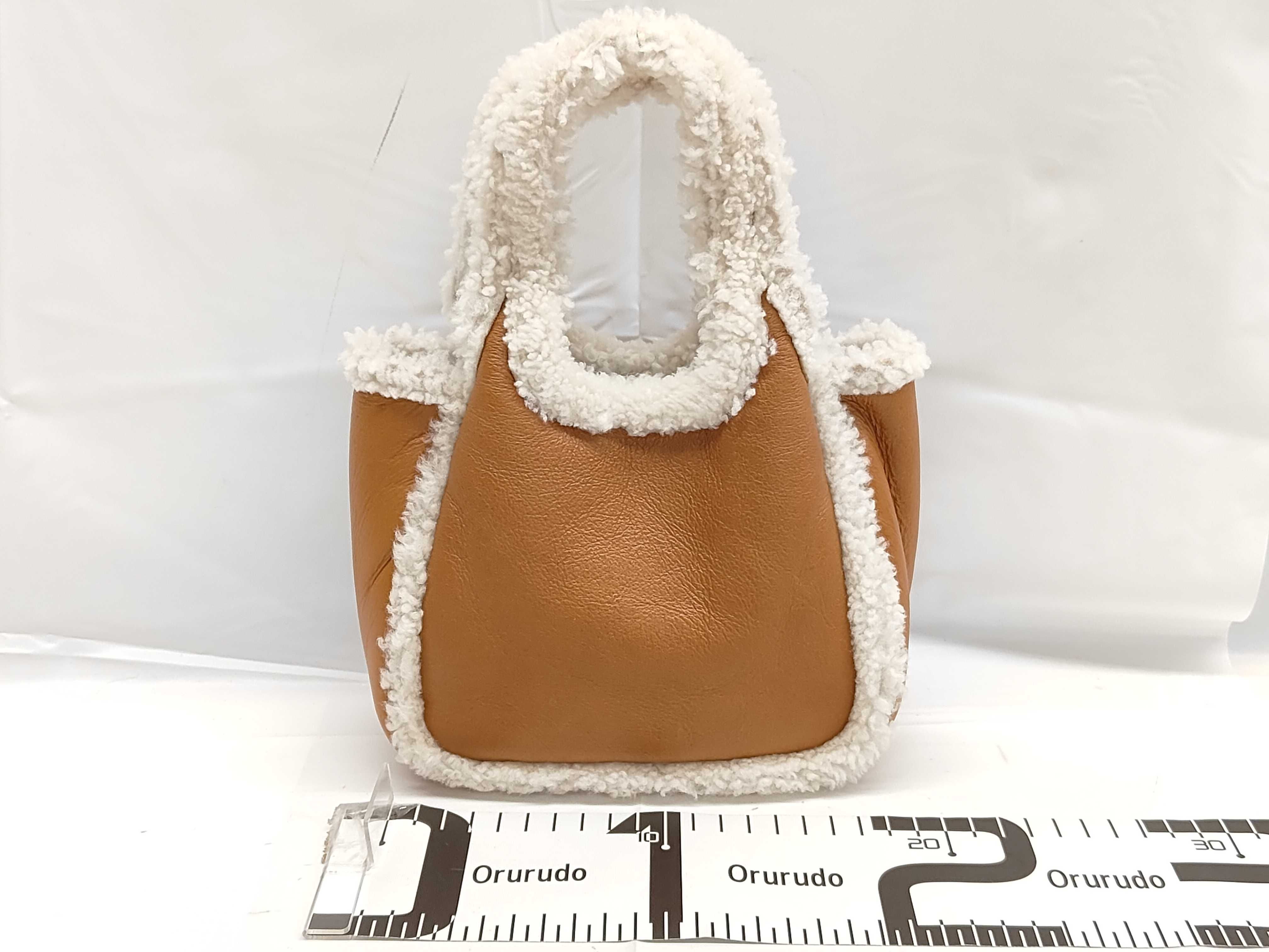 Leather Shearling Boa Handbag Brown Triangle Plate Bag — view 2