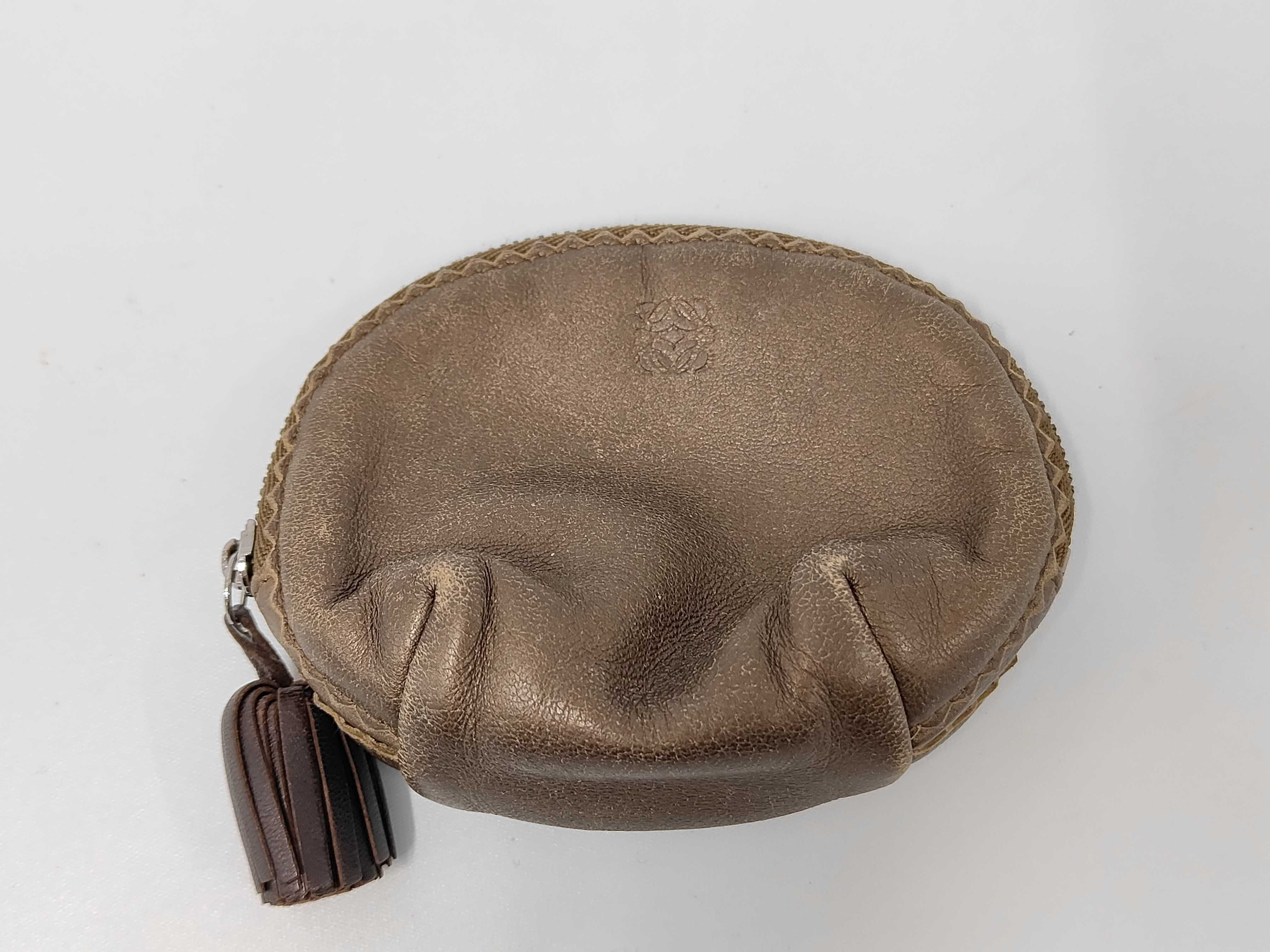coin case, fringe, Anagram design, leather, brown.