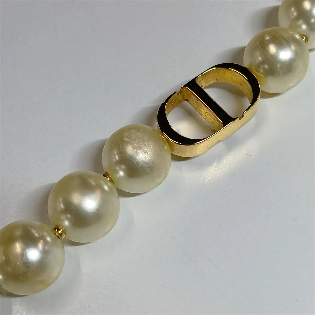 Petit CD necklace, gold-plated with faux pearls. Shows signs of wear, including — view 9