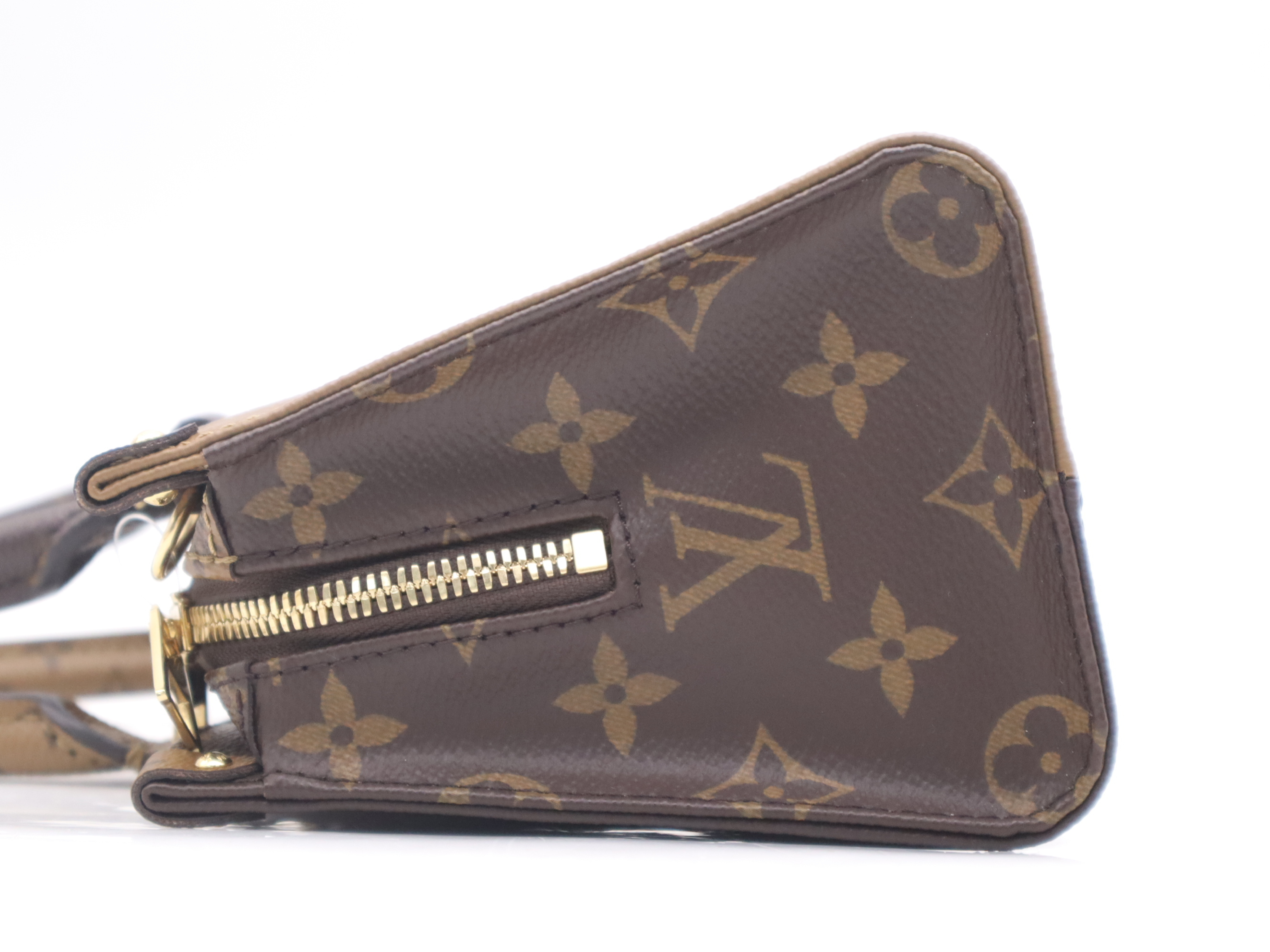 M46653 Monogram Giant Reverse On The Go EW Handbag with Shoulder Strap, Dust Bag, and Pouch — view 3
