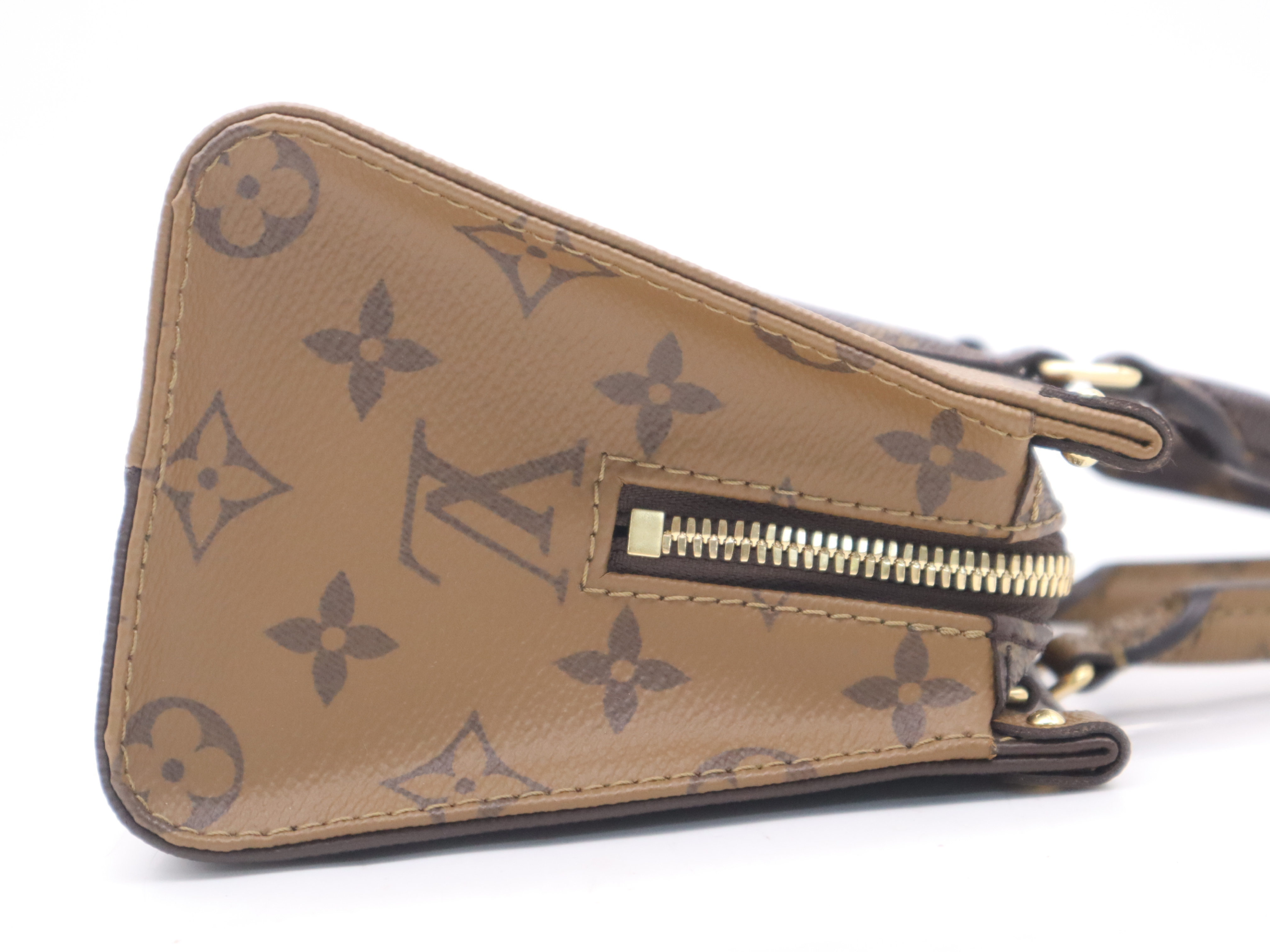 M46653 Monogram Giant Reverse On The Go EW Handbag with Shoulder Strap, Dust Bag, and Pouch — view 5