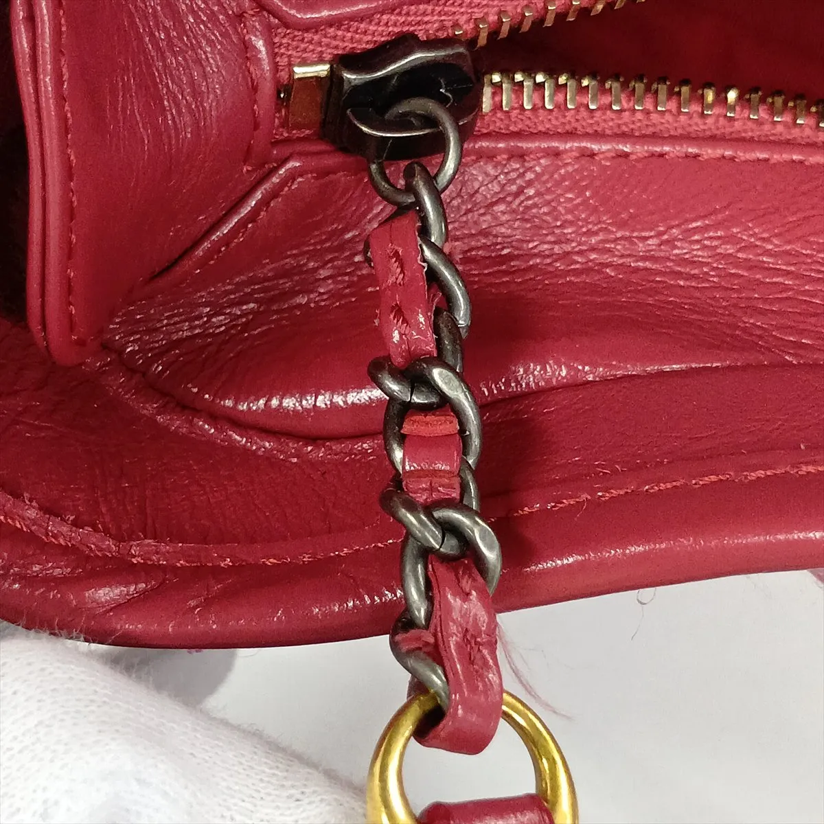 Gabrielle de Chanel tweed and leather chain shoulder bag, pink with gold and silver hardware, serial number 24. — view 12