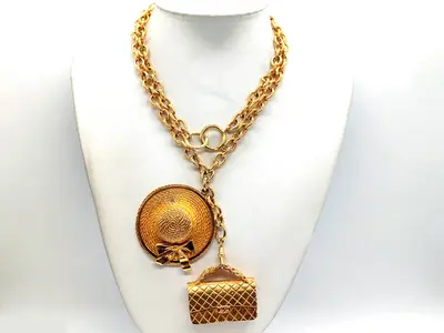 Coco Mark Matelassé bag, straw hat, double pendant necklace