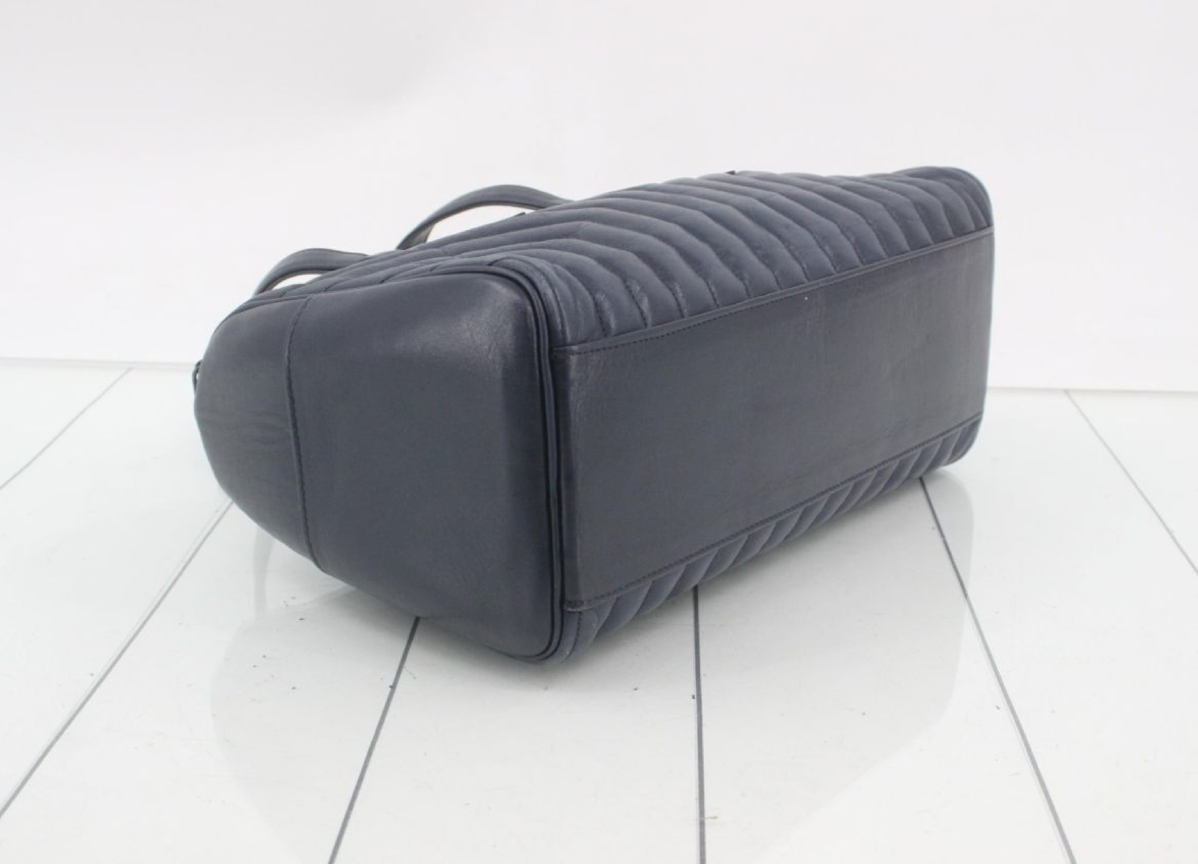 quilted leather navy handbag — view 5