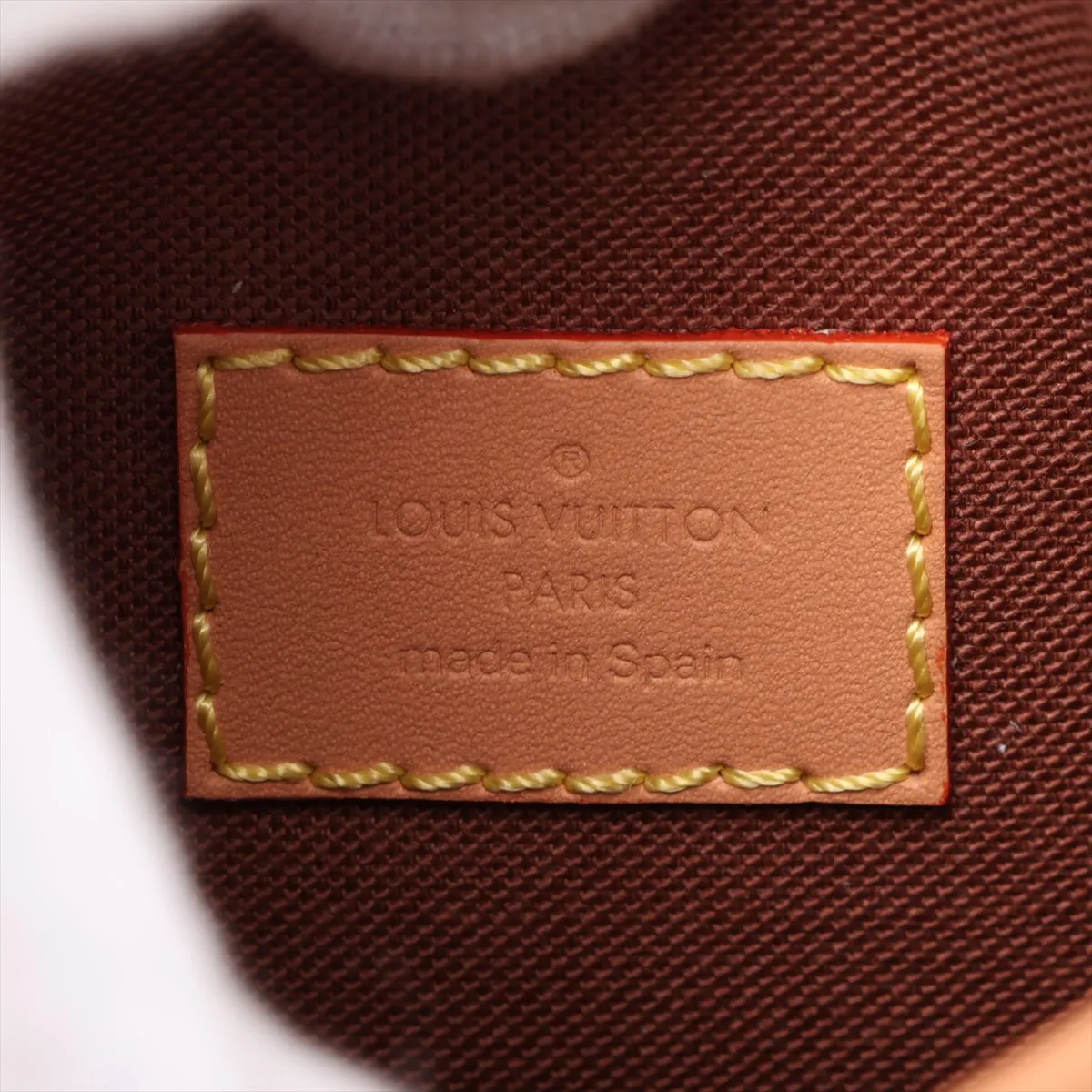 Monogram Fold Me Pouch M80874, serial number unknown, brown. — view 7