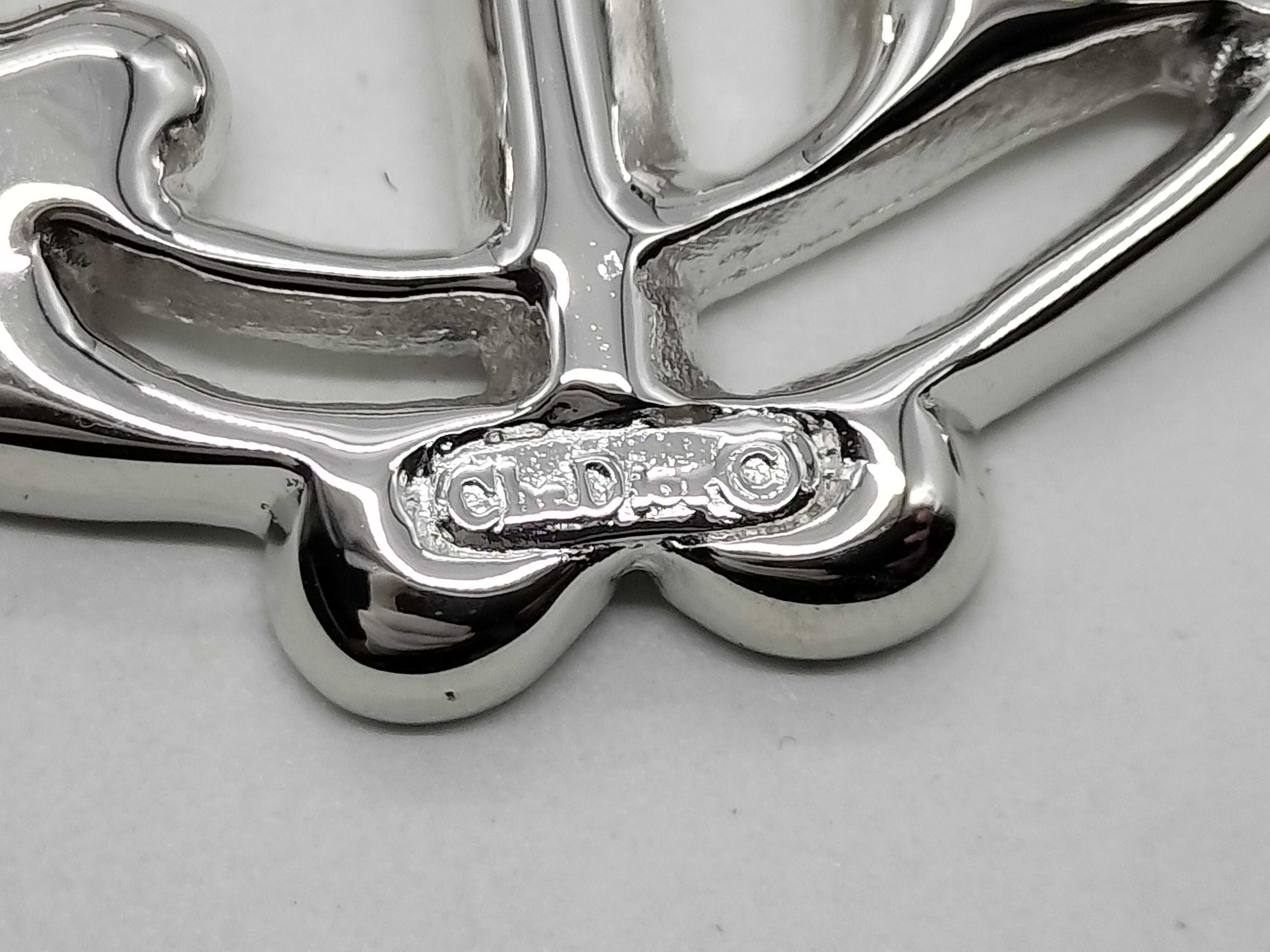 logo stone brooch (stone missing) — view 3
