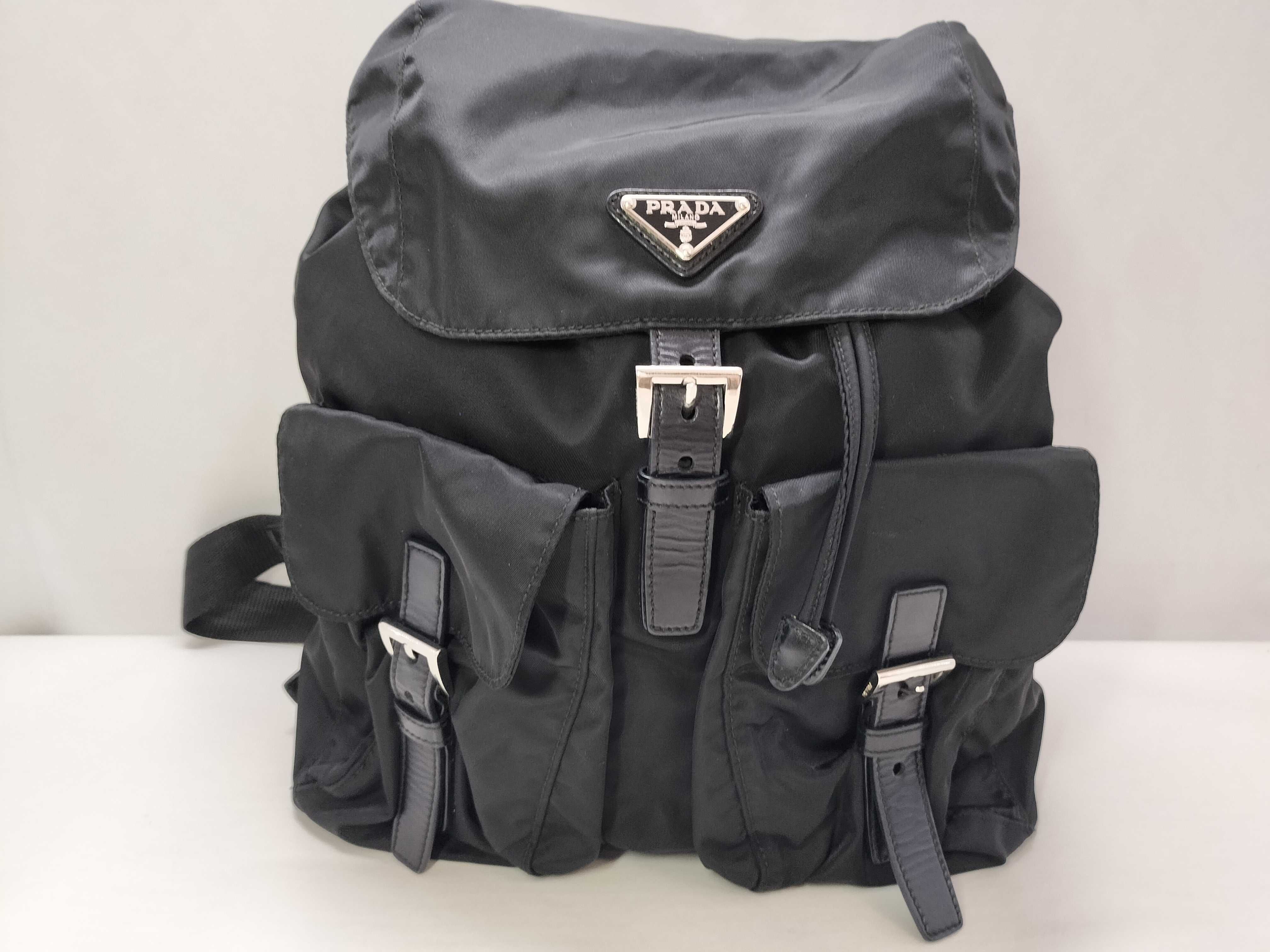 nylon backpack with triangular logo.