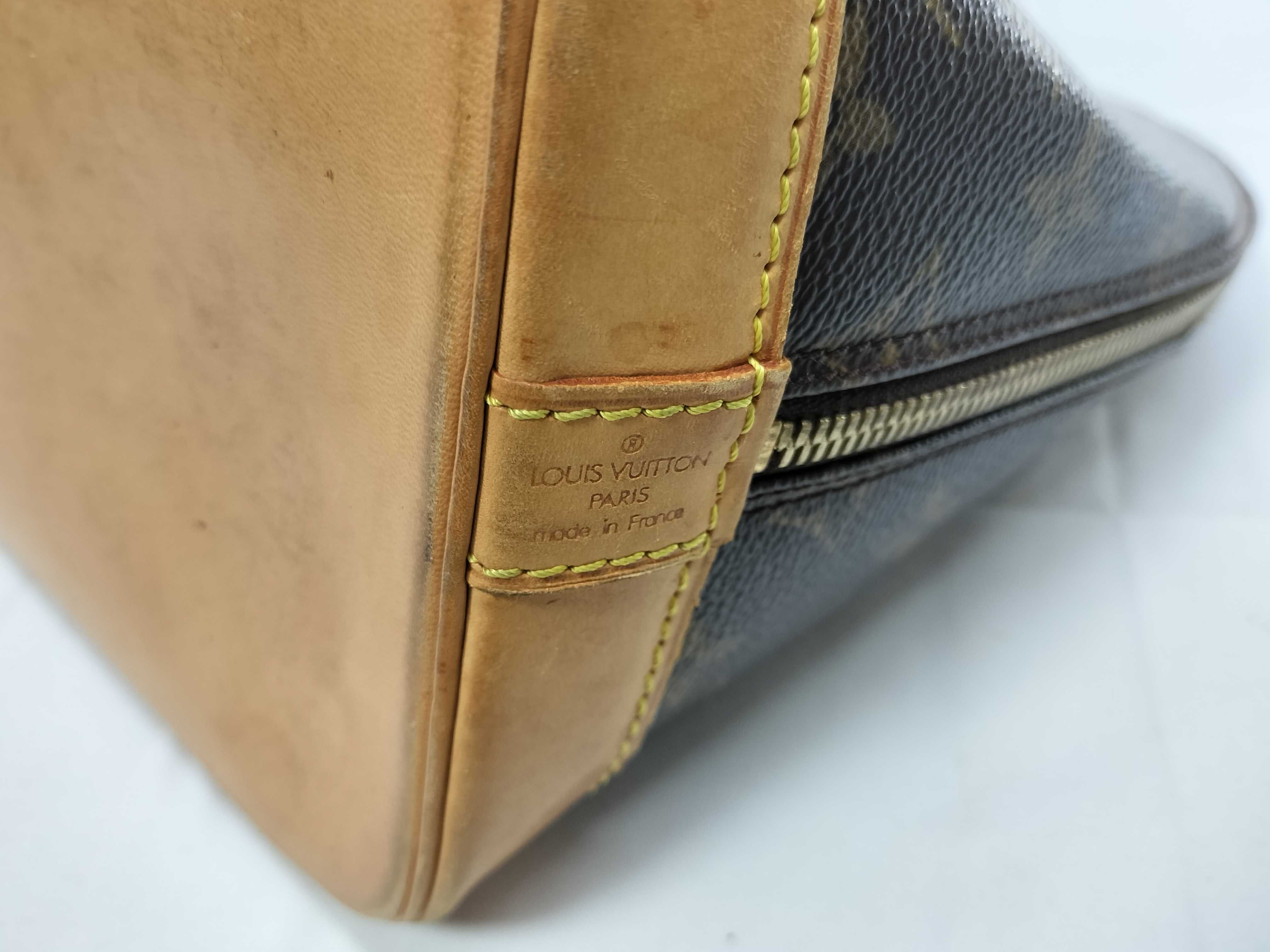 Monogram M40878 Alma MM Handbag — view 9
