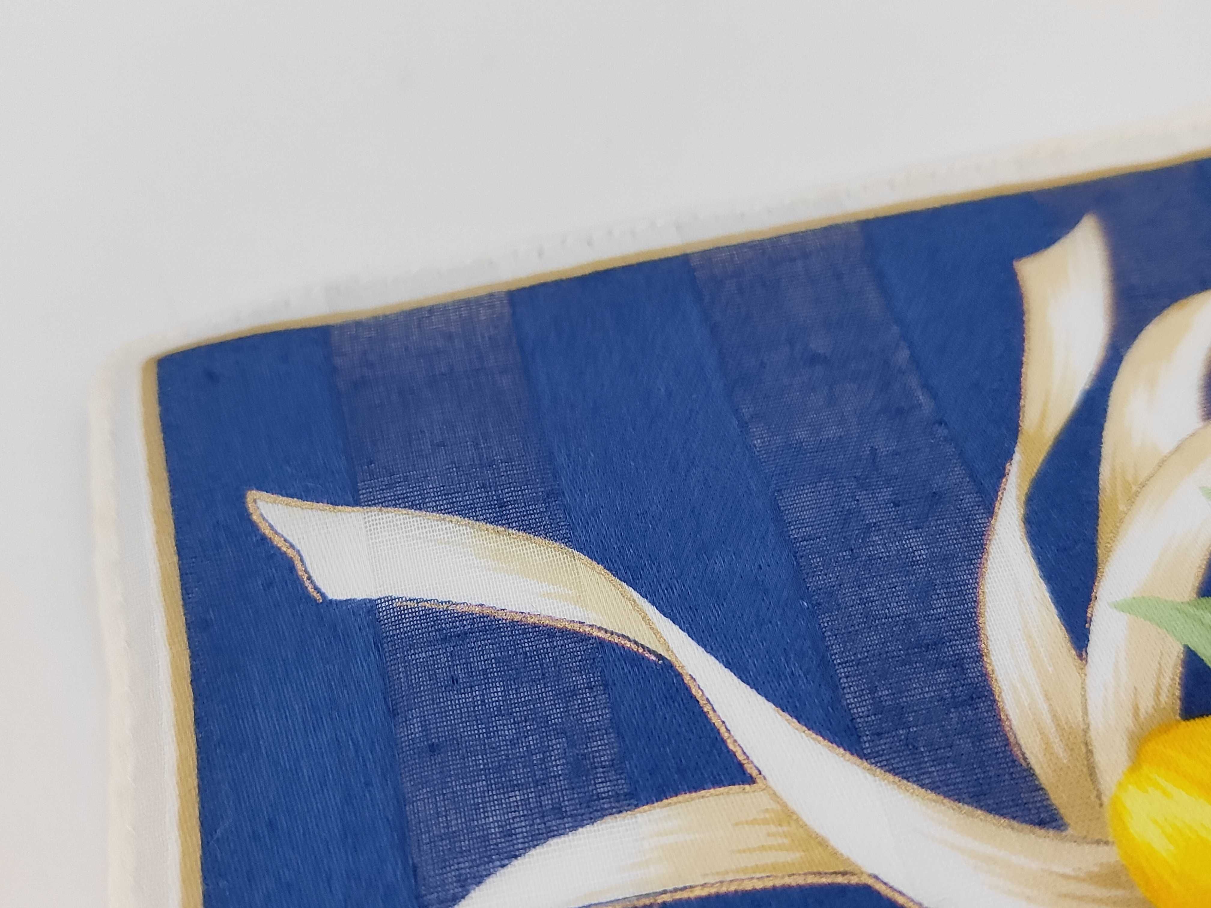 handkerchief scarf with sticker, logo, floral pattern, ribbon, navy, and other accessories. — view 5