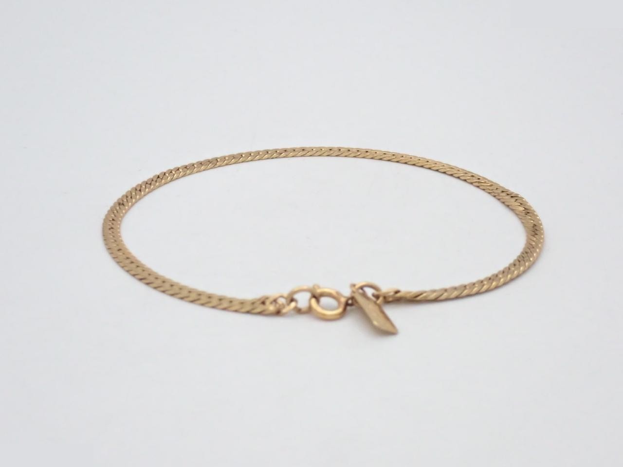Gold Cuban link chain bracelet by Yves Saint Laurent, wrist circumference approximately 20.5 cm. — view 2