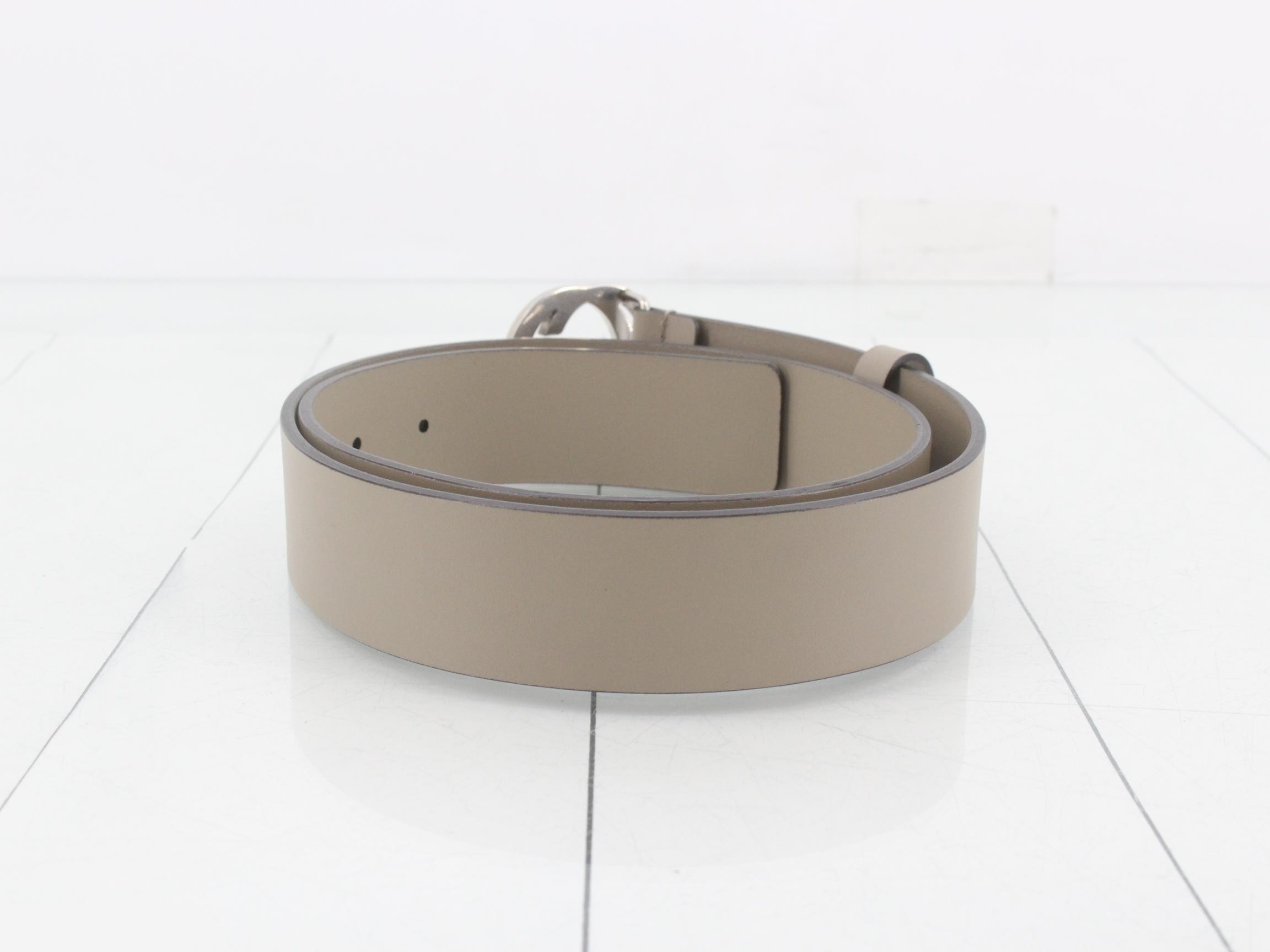 Interlocking belt, beige, unused, stored item. — view 2