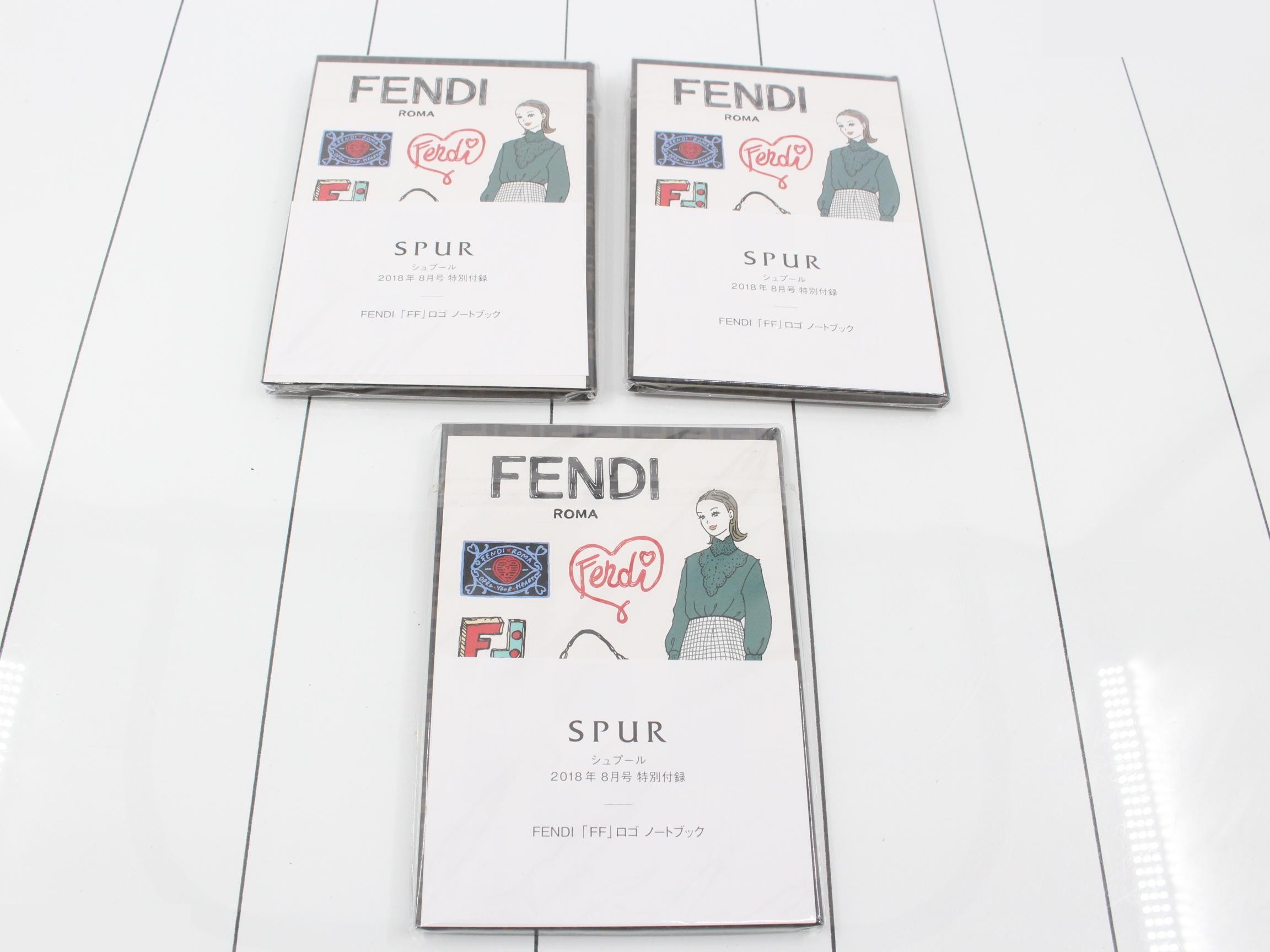 Unused Fendi novelty notebooks, set of 3.