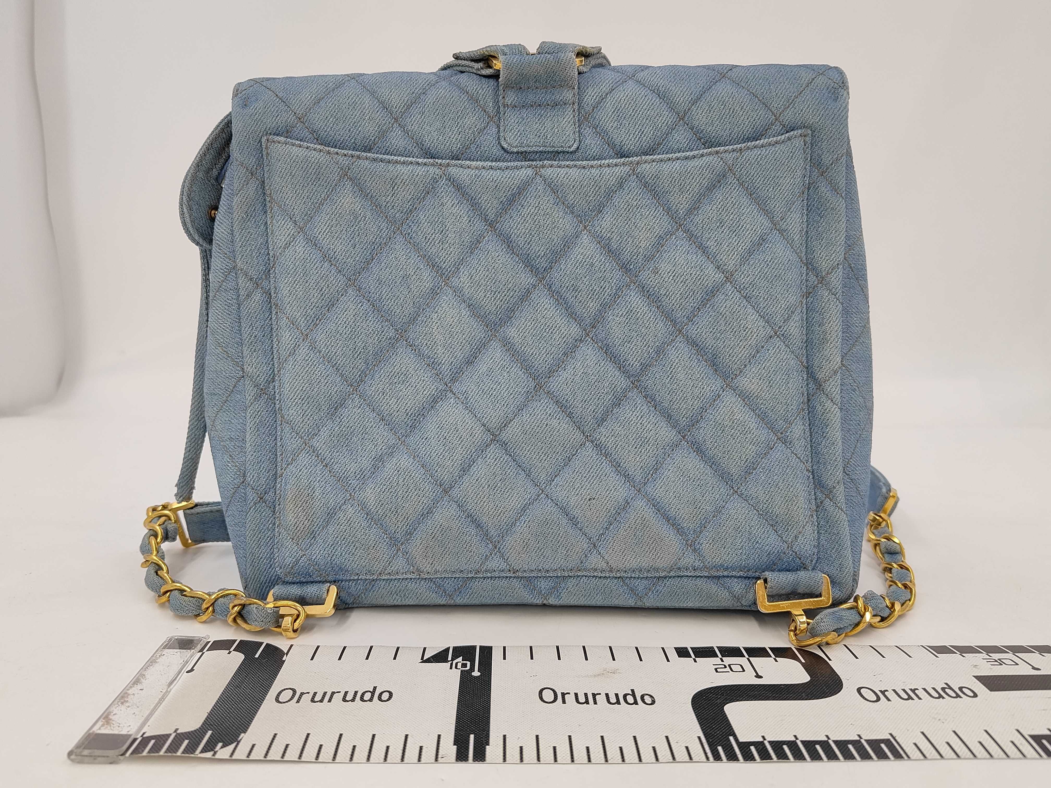 denim backpack with gold hardware and chain strap (model number 4) — view 2
