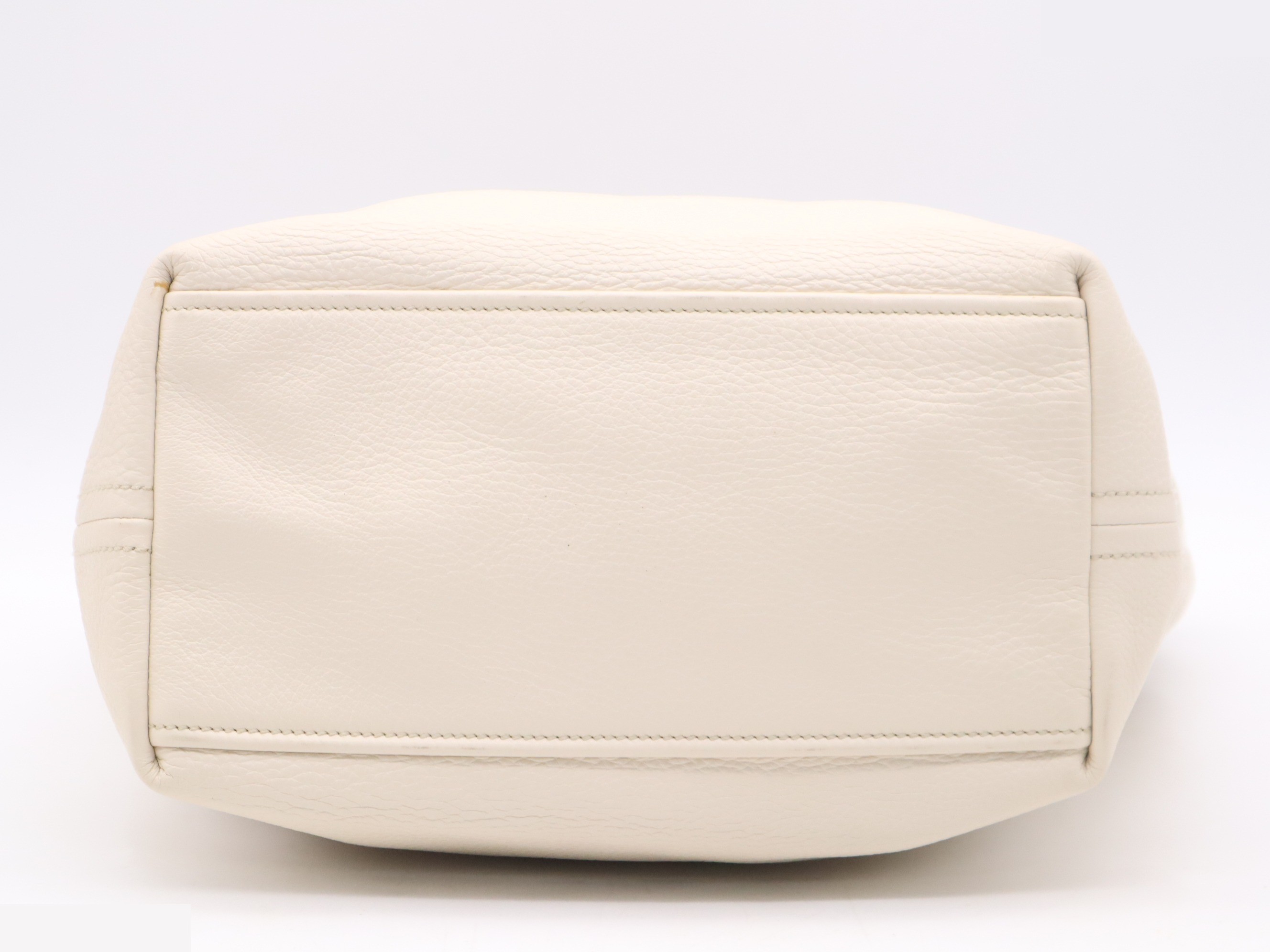 Leather one-shoulder bag, ivory. Includes guarantee card, name tag, and dust bag. — view 4