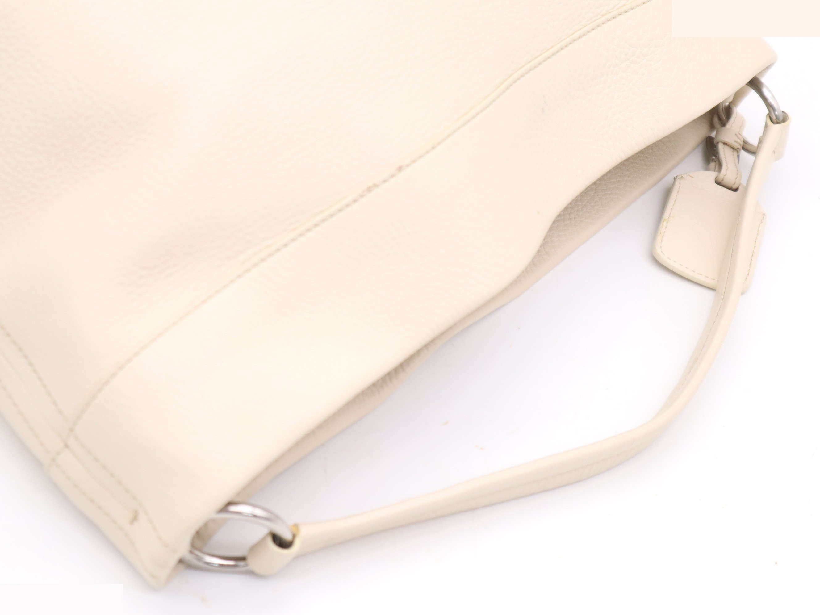 Leather one-shoulder bag, ivory. Includes guarantee card, name tag, and dust bag. — view 6
