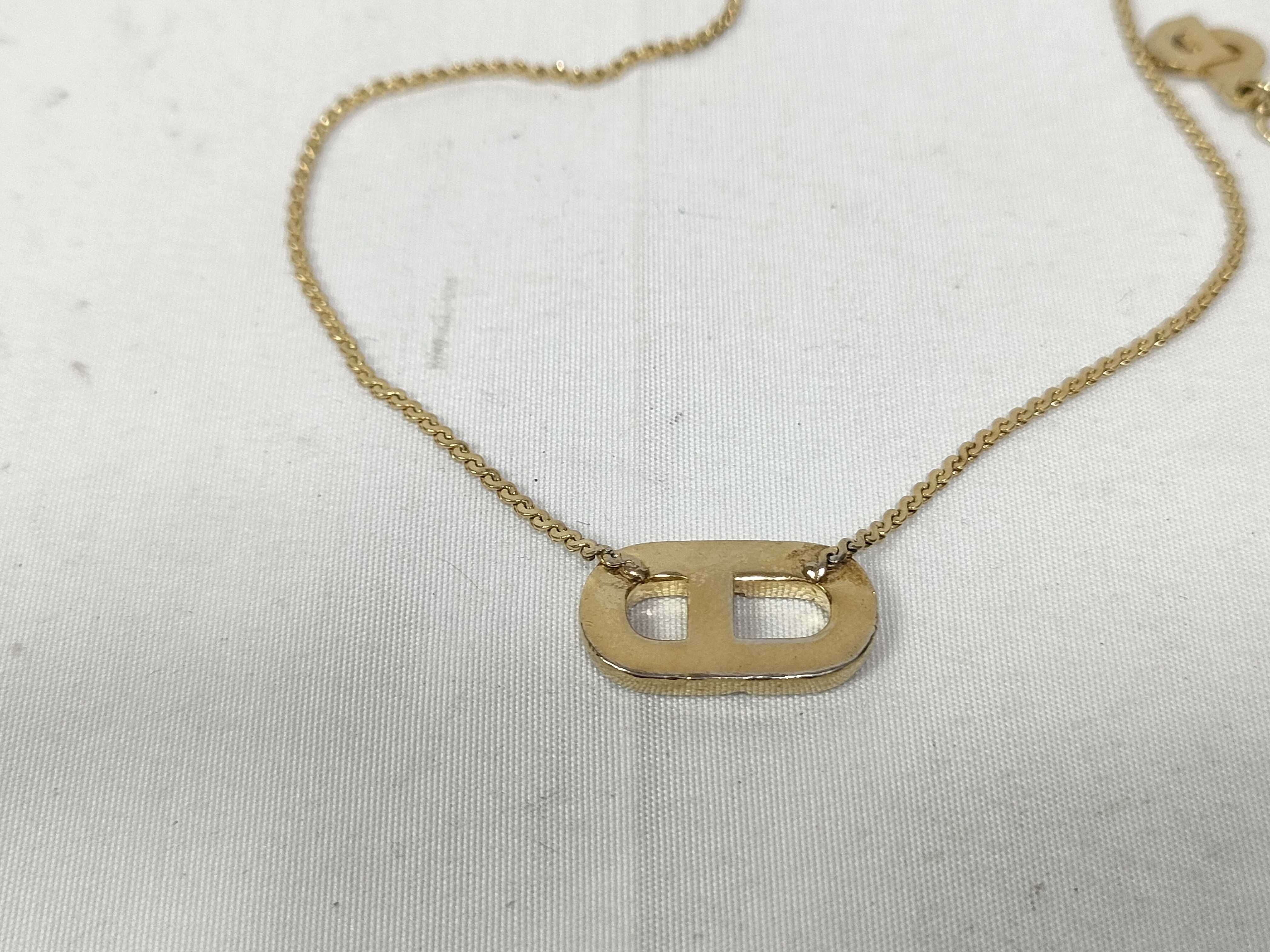 necklace with CD logo — view 2