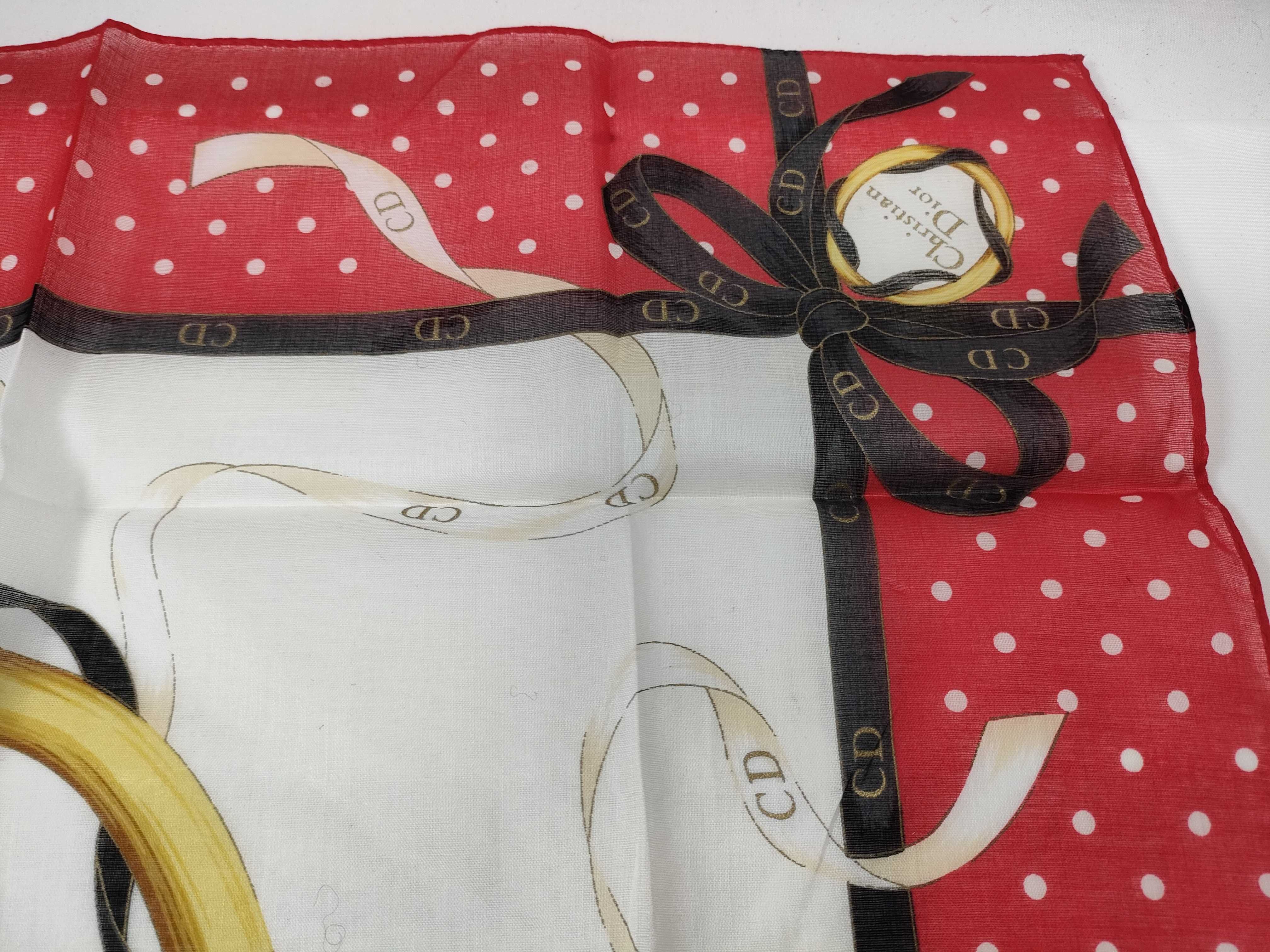 handkerchief scarf with sticker, CD logo, emblem, ribbon, polka dots, and other accessories. — view 9