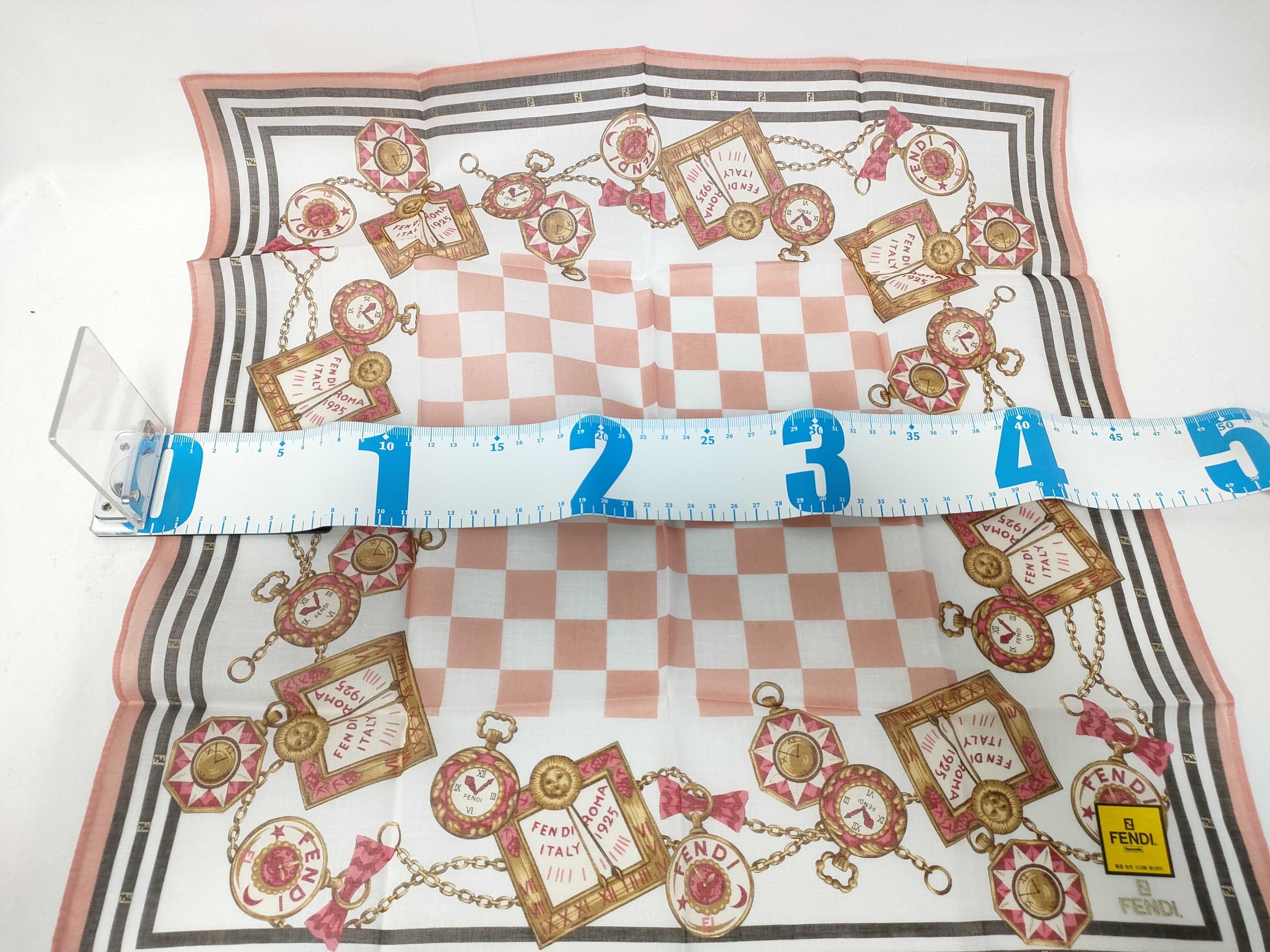 handkerchief scarf with sticker, clock pattern, checkerboard, pink, and other accessories. — view 2
