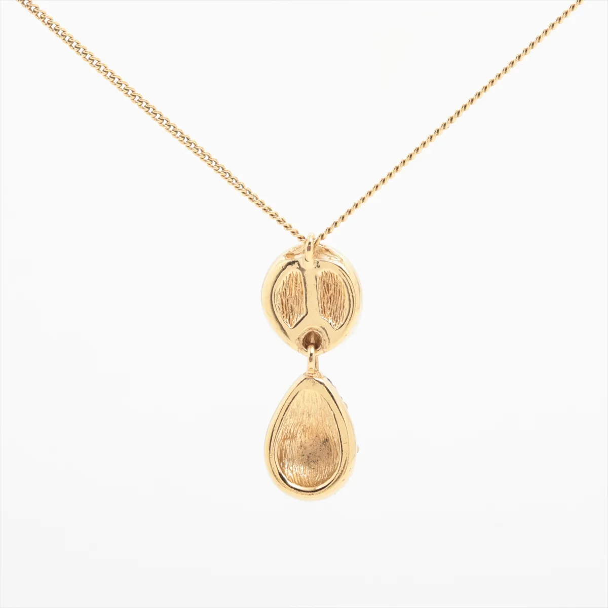 CD logo necklace, gold plated with rhinestones. Shows signs of wear, — view 2
