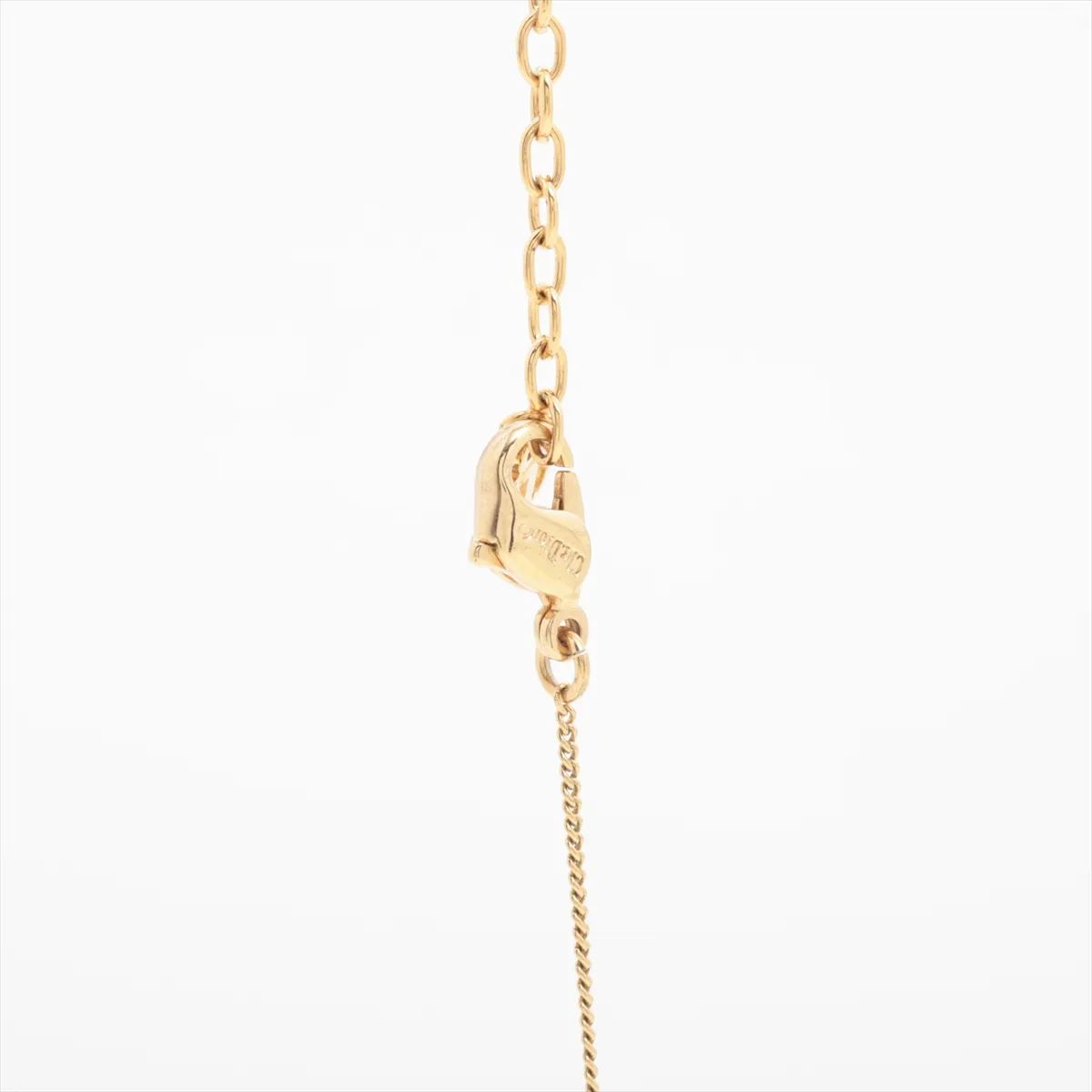 CD logo necklace, gold plated with rhinestones. Shows signs of wear, — view 3