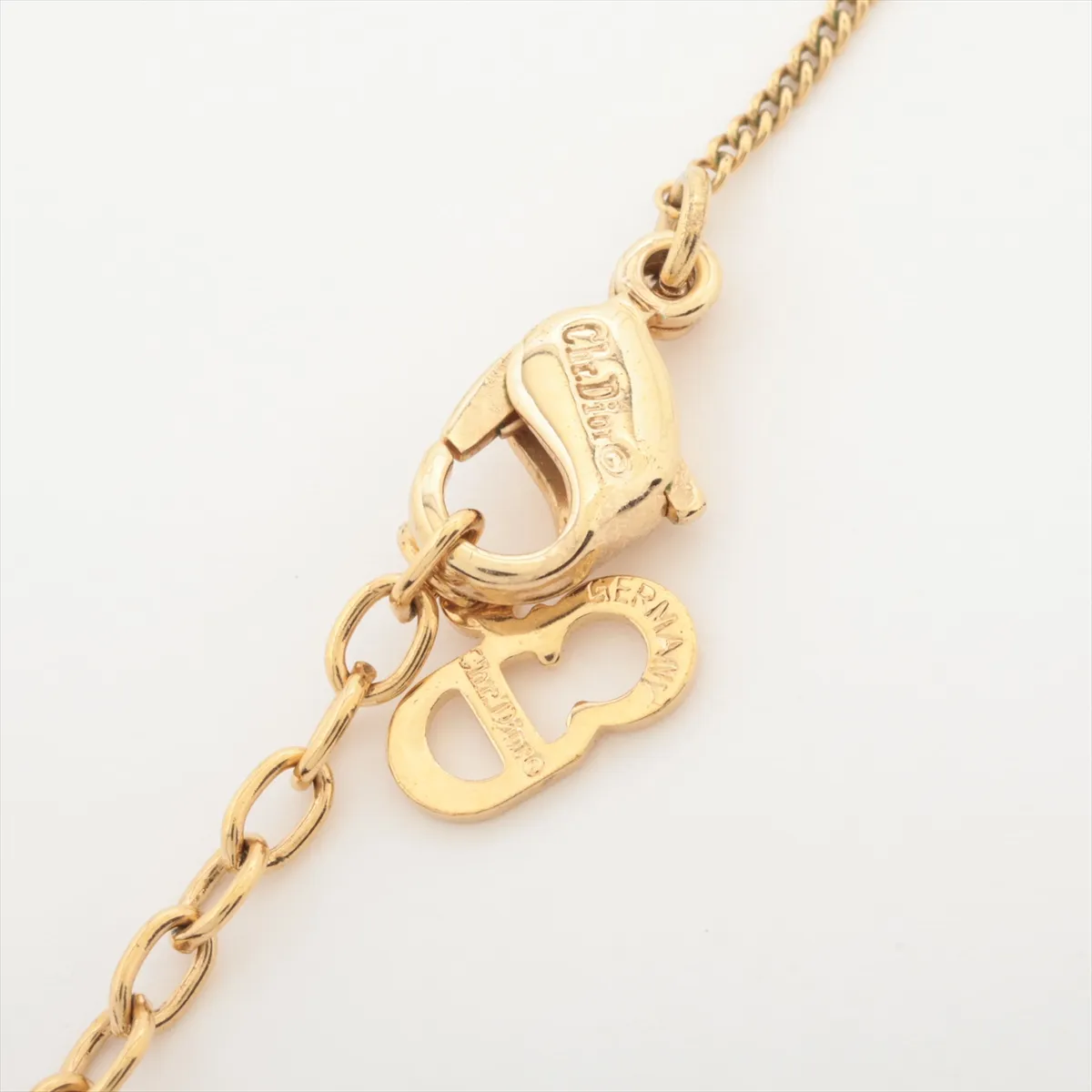 CD logo necklace, gold plated with rhinestones. Shows signs of wear, — view 4