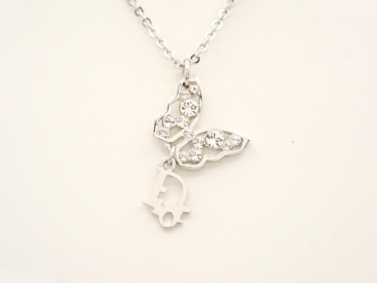 Butterfly necklace/pendant, approximately 52cm in circumference.