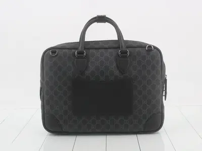 Unused GG Supreme briefcase with strap.