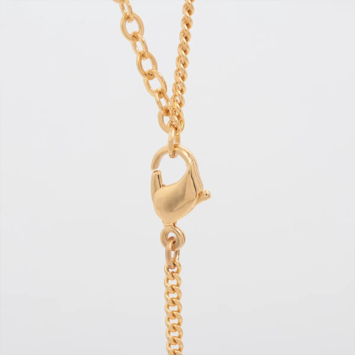 CD logo necklace, gold plated with rhinestones, black and gold. Shows signs of wear, — view 3