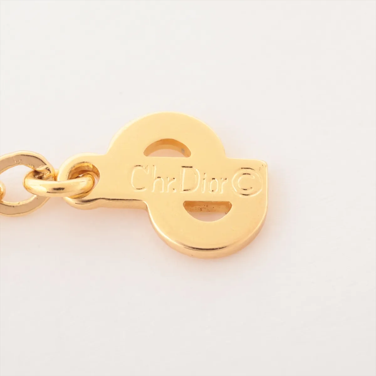 CD logo necklace, gold plated with rhinestones, black and gold. Shows signs of wear, — view 4