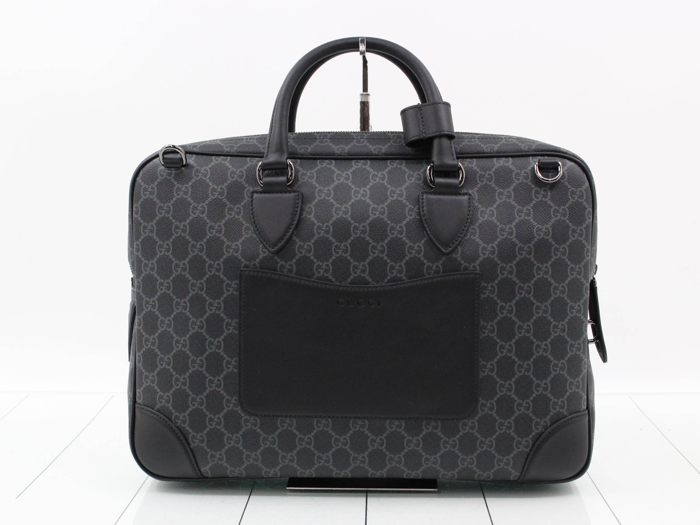 Unused GG Supreme briefcase with strap.
