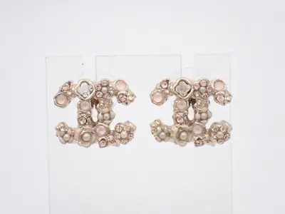 earrings, B11A, Coco Mark flower design, rhinestones, 2cm wide.