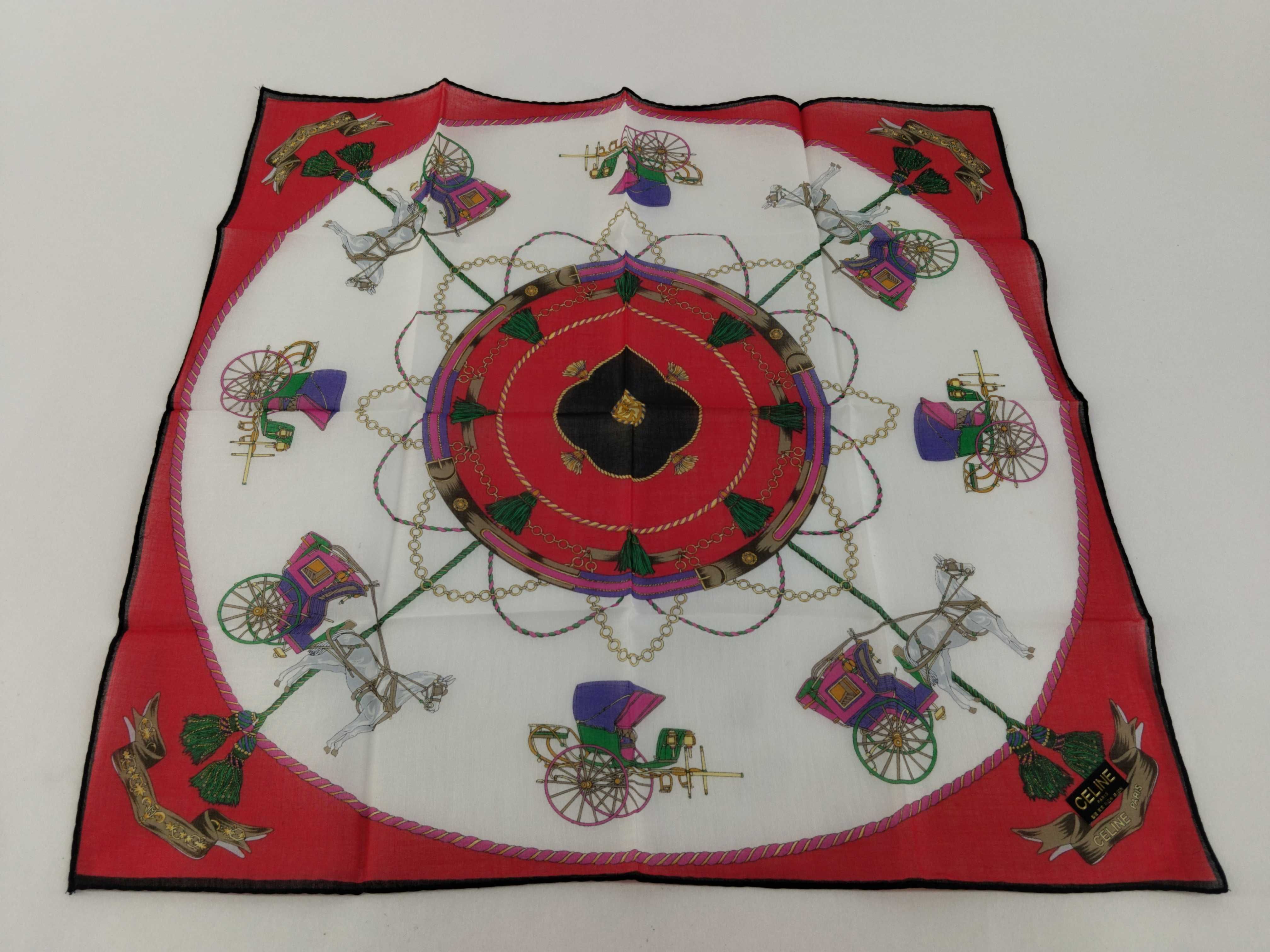handkerchief scarf with sticker, logo, carriage pattern, red, tassel, and other accessories.