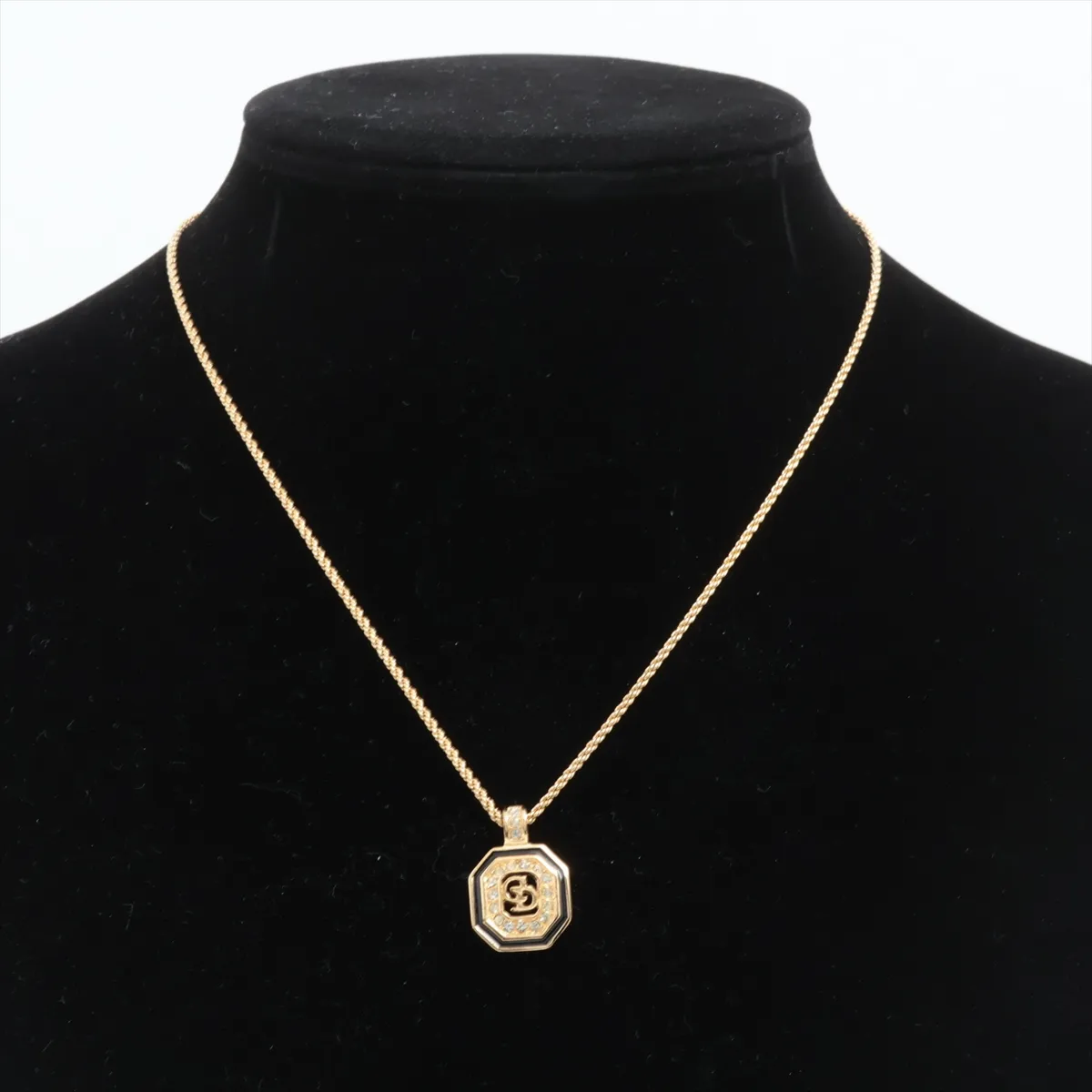 CD logo necklace, gold plated with rhinestones. Shows signs of wear, — view 5