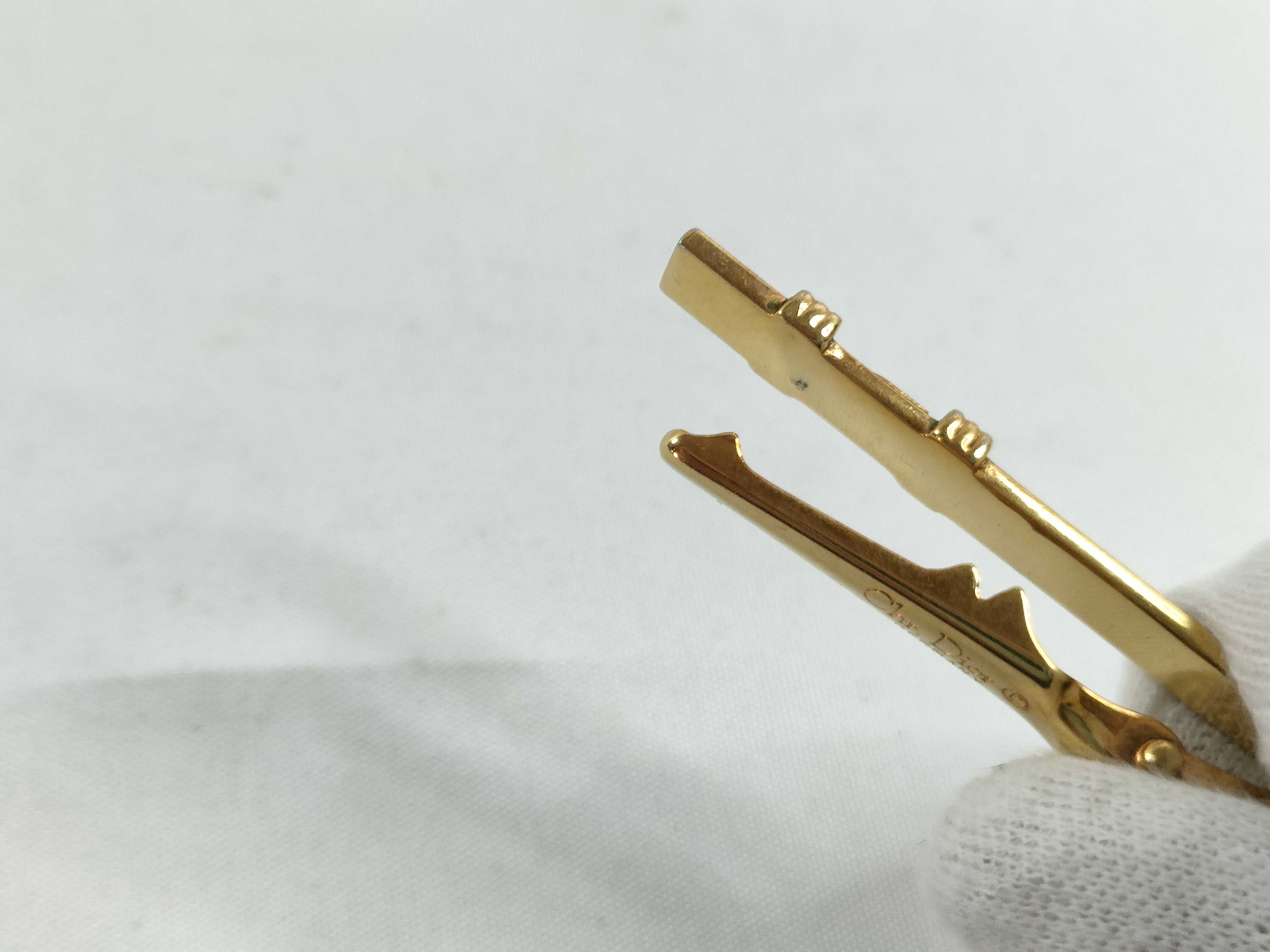 A. Tie clip, Tie clip and cufflinks — view 6