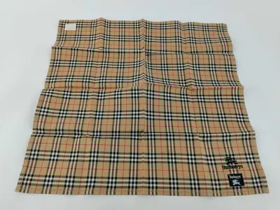 handkerchief/scarf with sticker, horse logo embroidery, Nova Check pattern, beige, and other accessories.