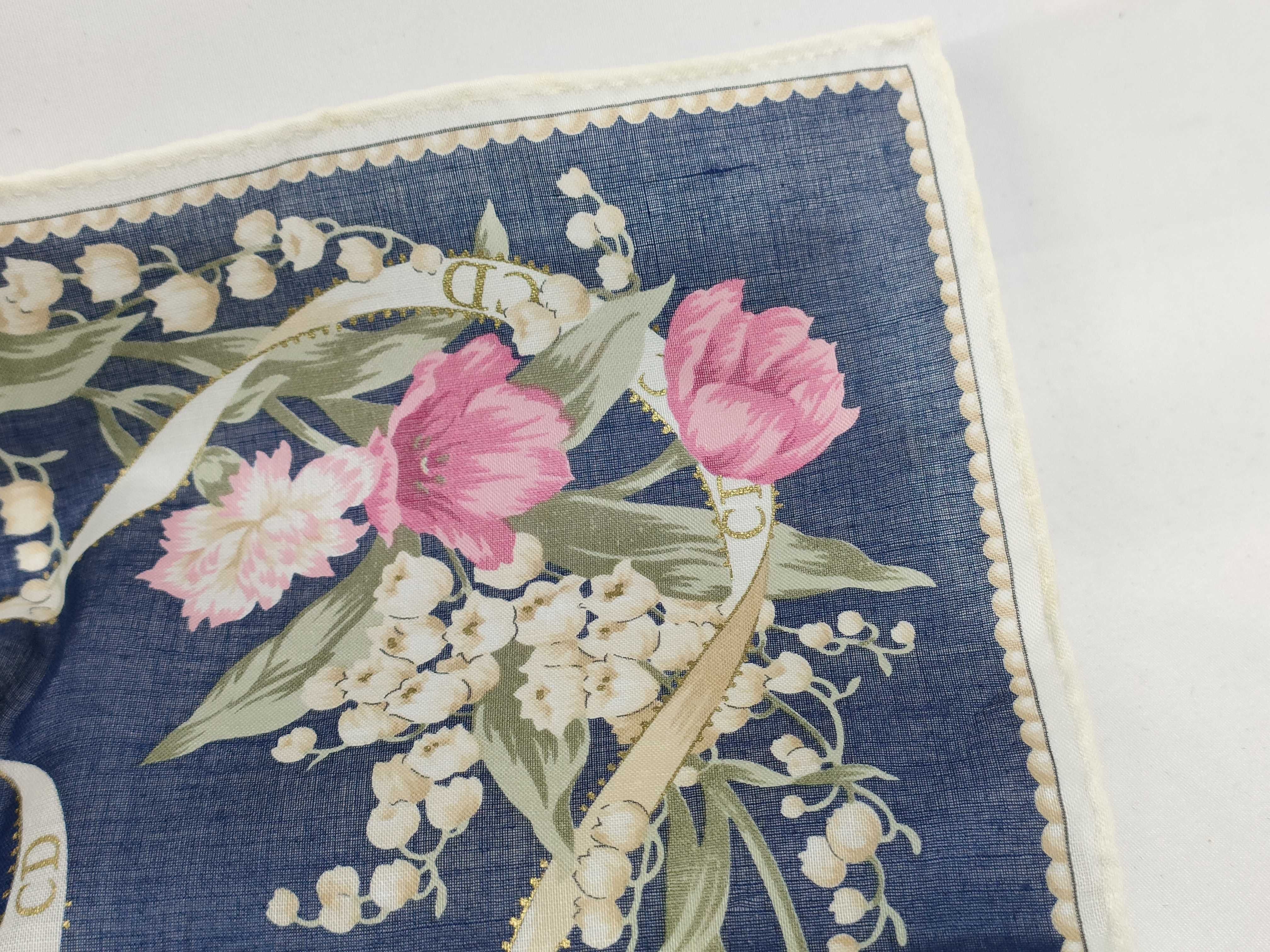 handkerchief scarf with sticker, emblem, ribbon, flower, and other accessories. — view 5