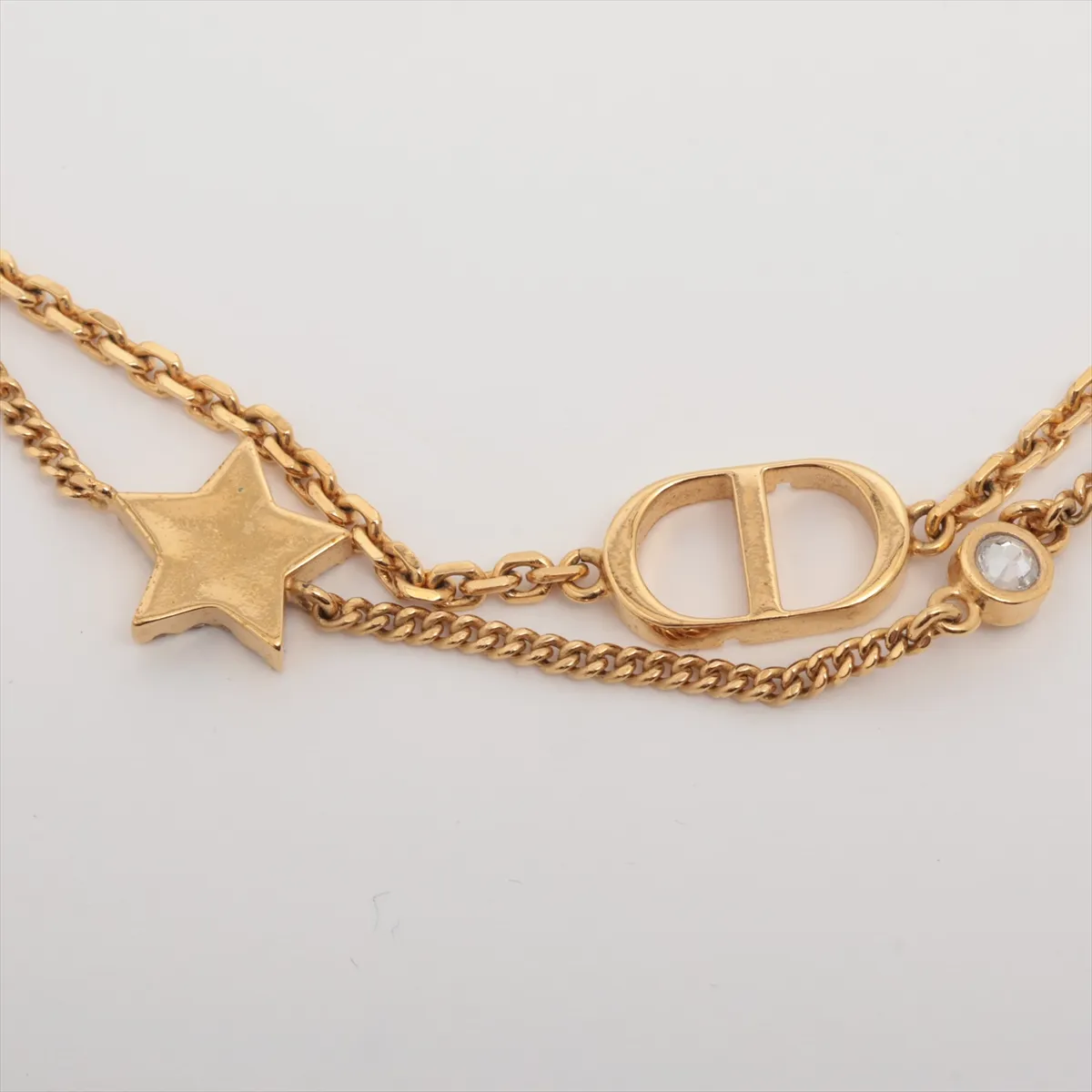 Petit CD bracelet, gold-plated with rhinestones. Shows signs of wear, — view 3