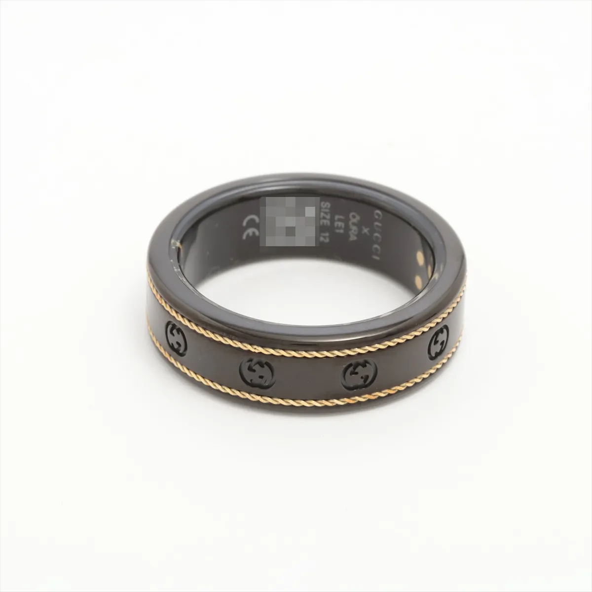 x Aura Interlocking G Ring, Size 12, Titanium, Black x Gold. Shows — view 2