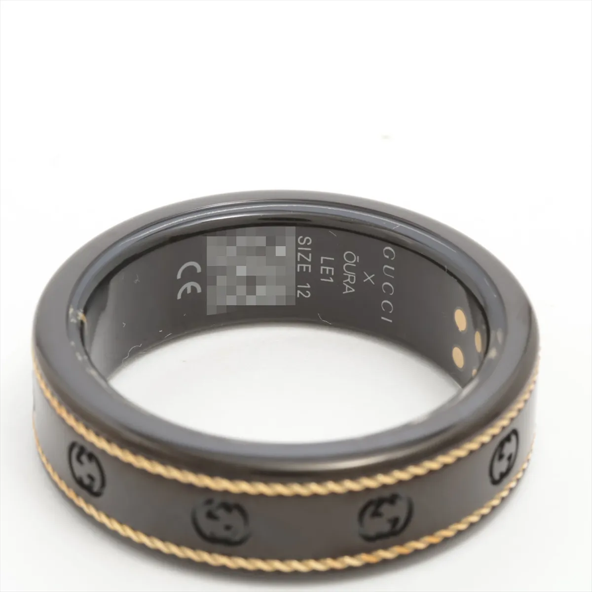 x Aura Interlocking G Ring, Size 12, Titanium, Black x Gold. Shows — view 3