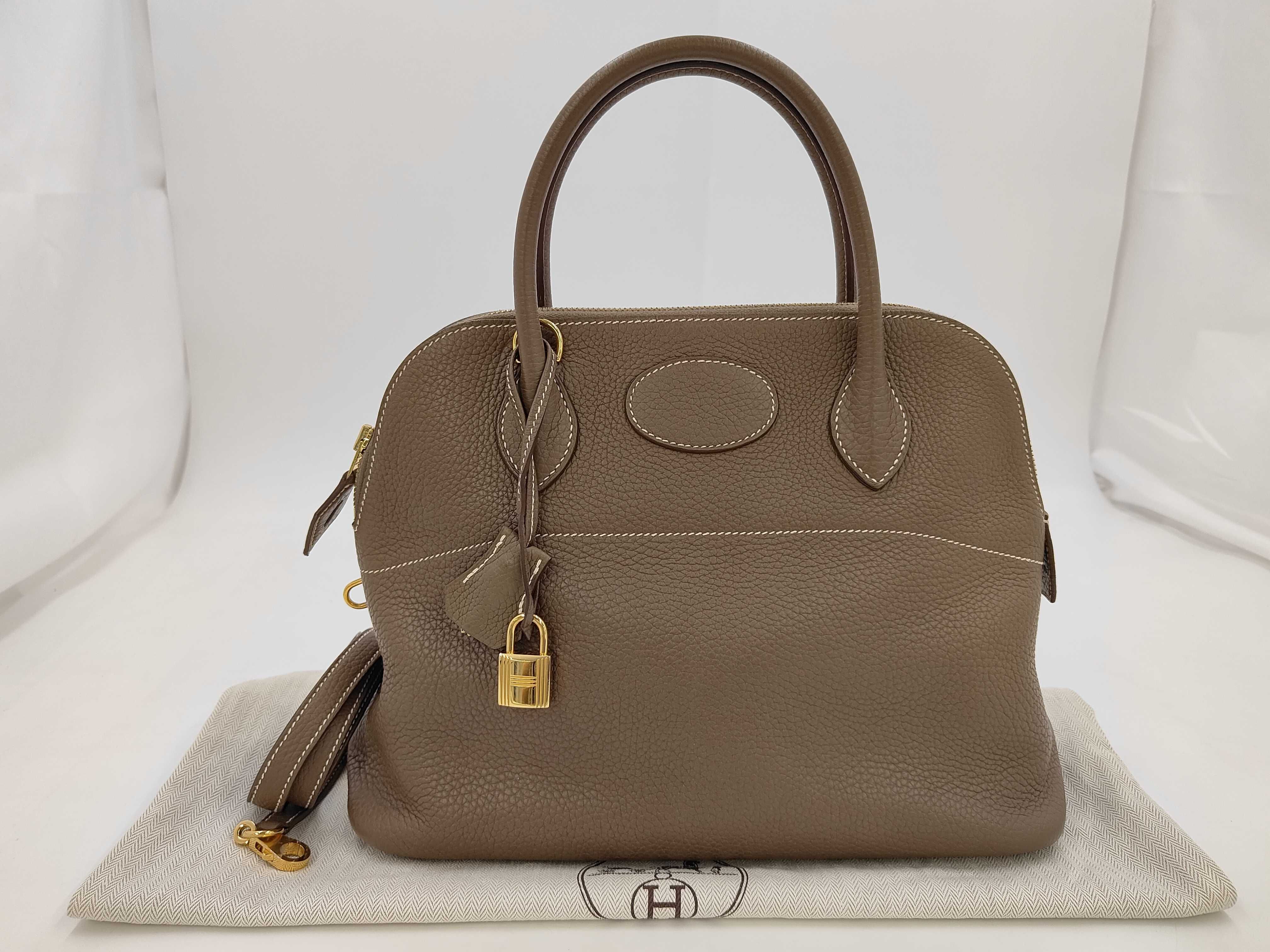 Bolide 31 2-way handbag, Taurillon Clemence leather, Etoupe color, gold hardware, tote bag