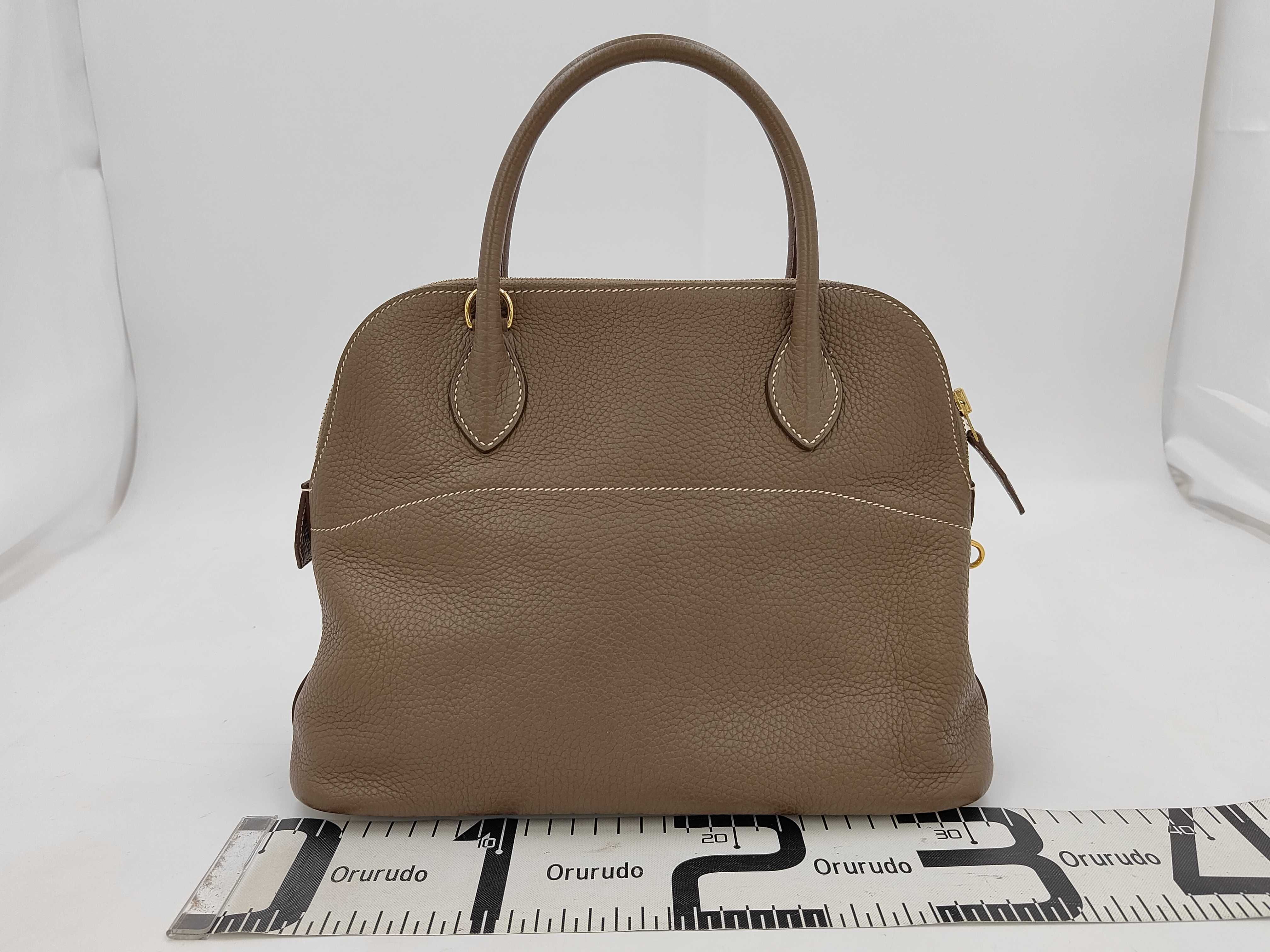 Bolide 31 2-way handbag, Taurillon Clemence leather, Etoupe color, gold hardware, tote bag — view 2