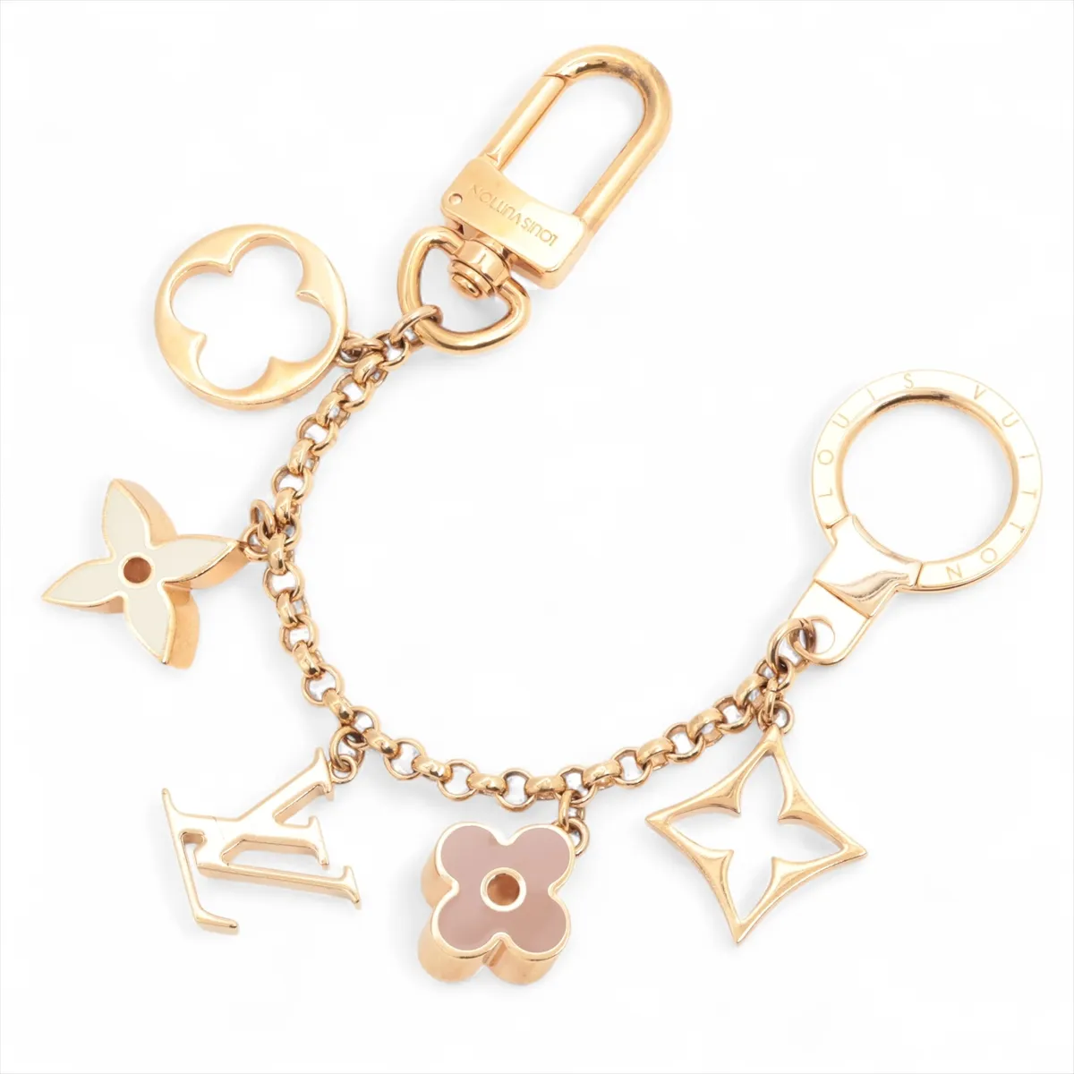 M65111 Fleur de Monogram DP0175 Charm GP Gold. Shows signs of wear, including