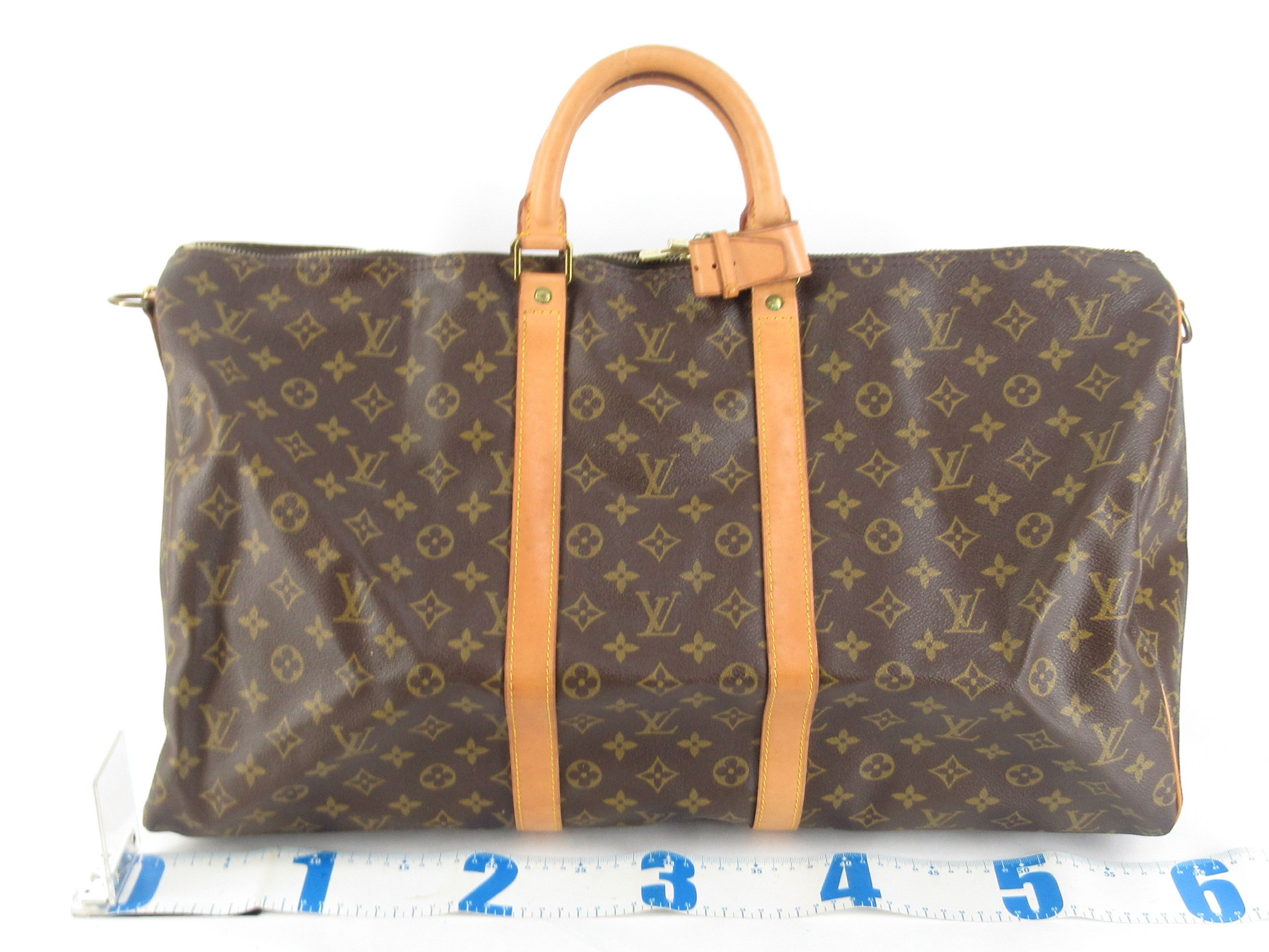 Monogram Keepall 55 Boston bag, bandolier, discoloration, scuffs. — view 2