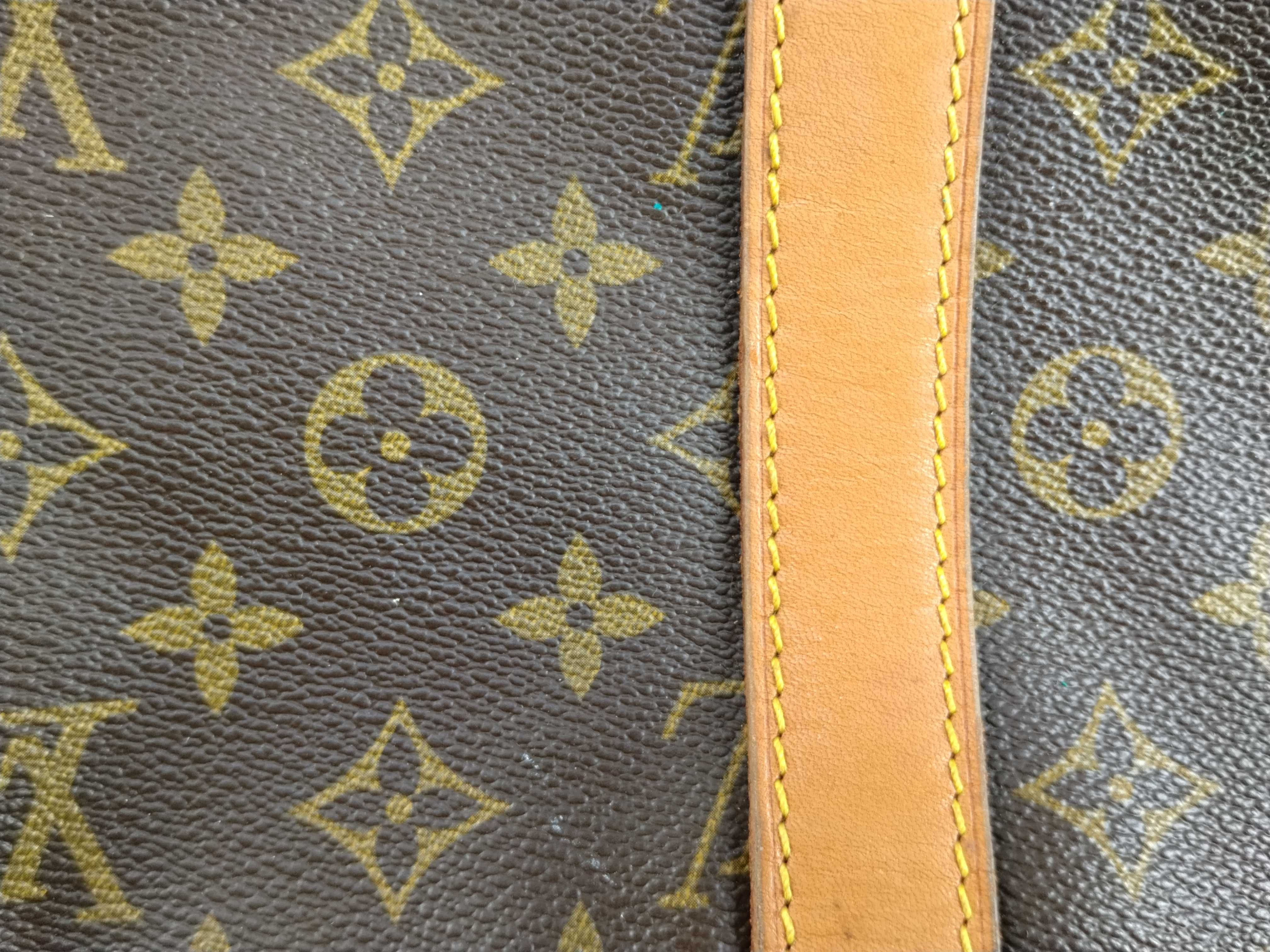 Monogram Keepall 55 Boston bag, bandolier, discoloration, scuffs. — view 12