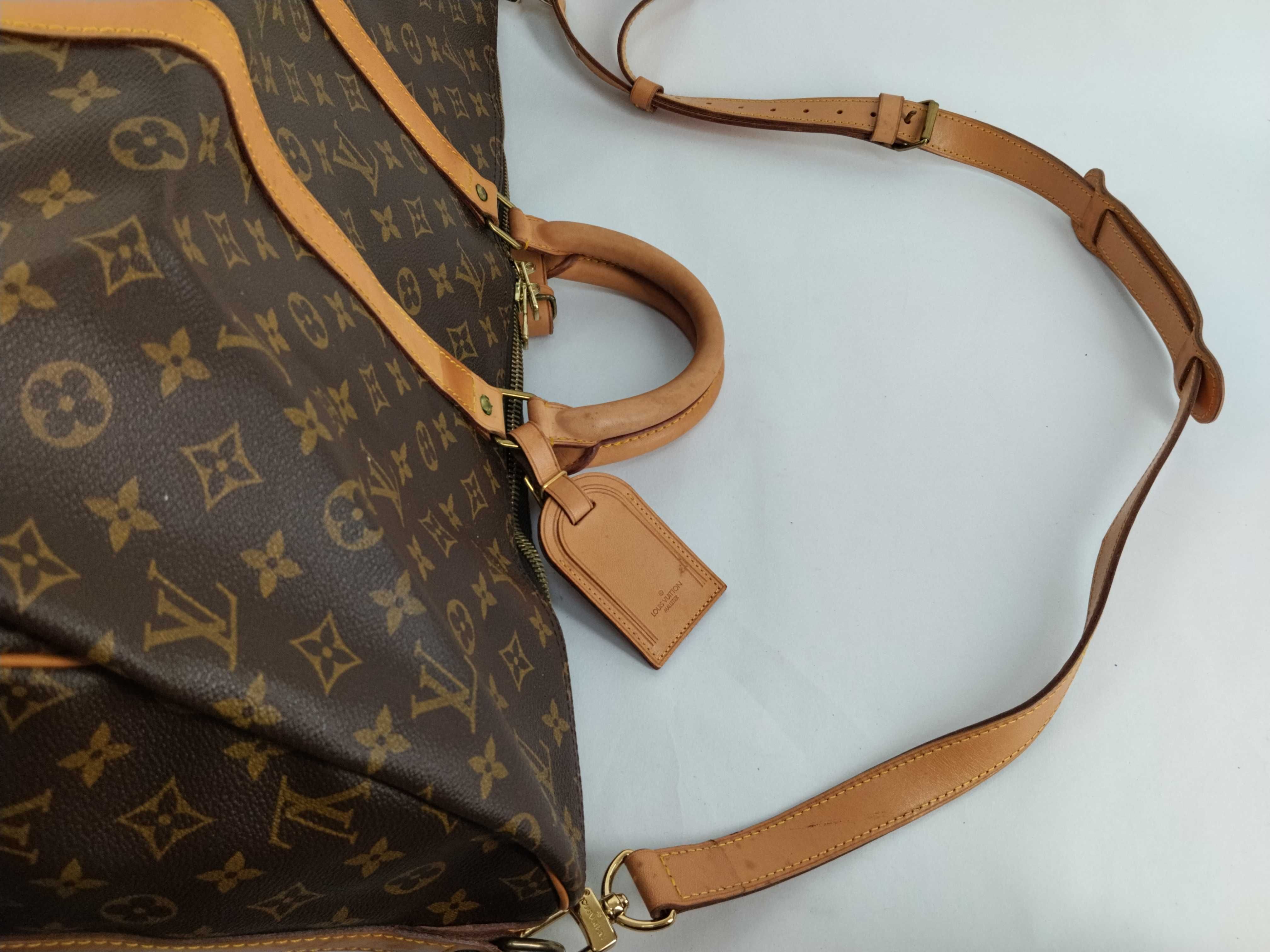 Monogram Keepall 55 Boston bag, bandolier, discoloration, scuffs. — view 3