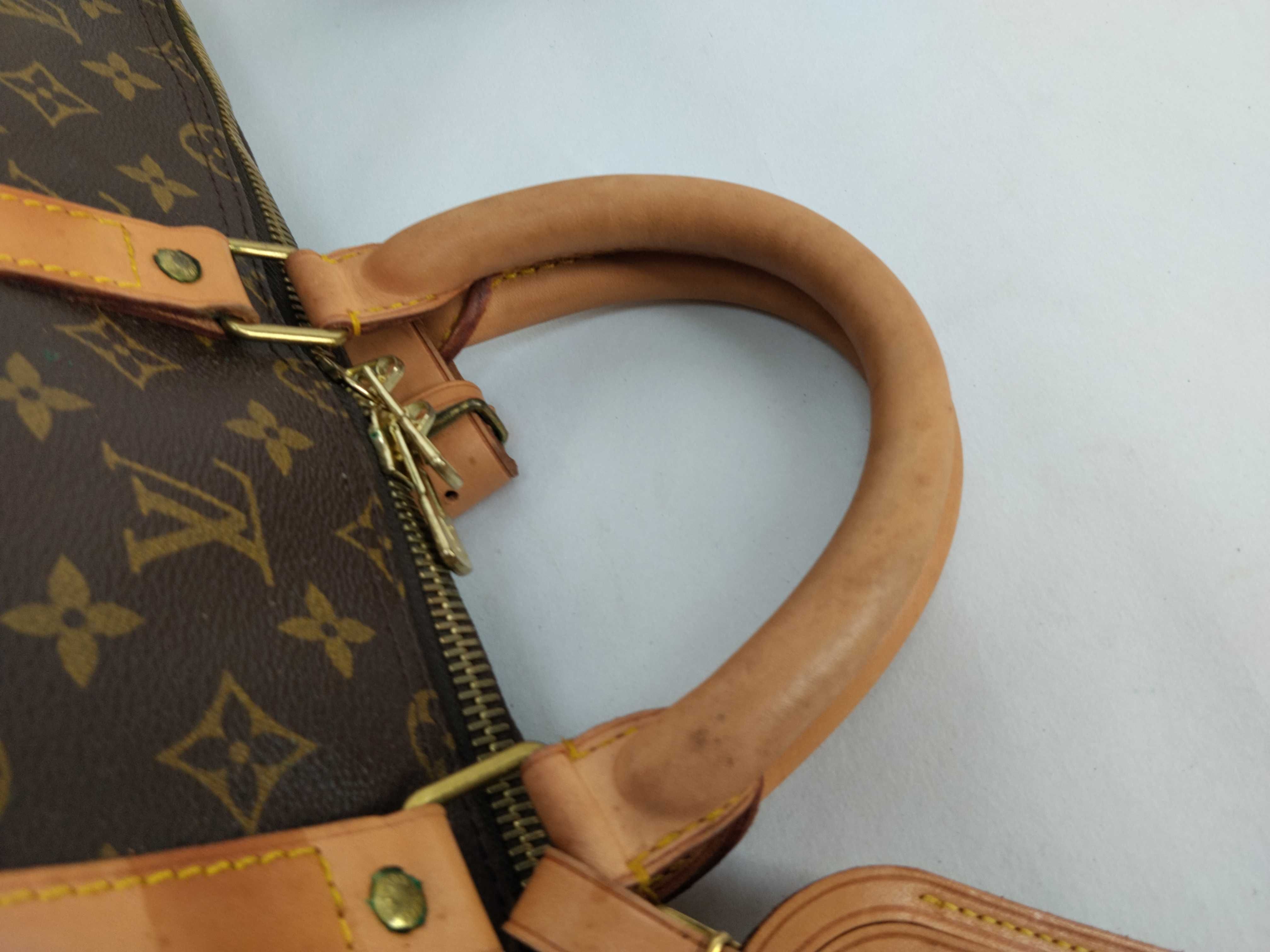 Monogram Keepall 55 Boston bag, bandolier, discoloration, scuffs. — view 4